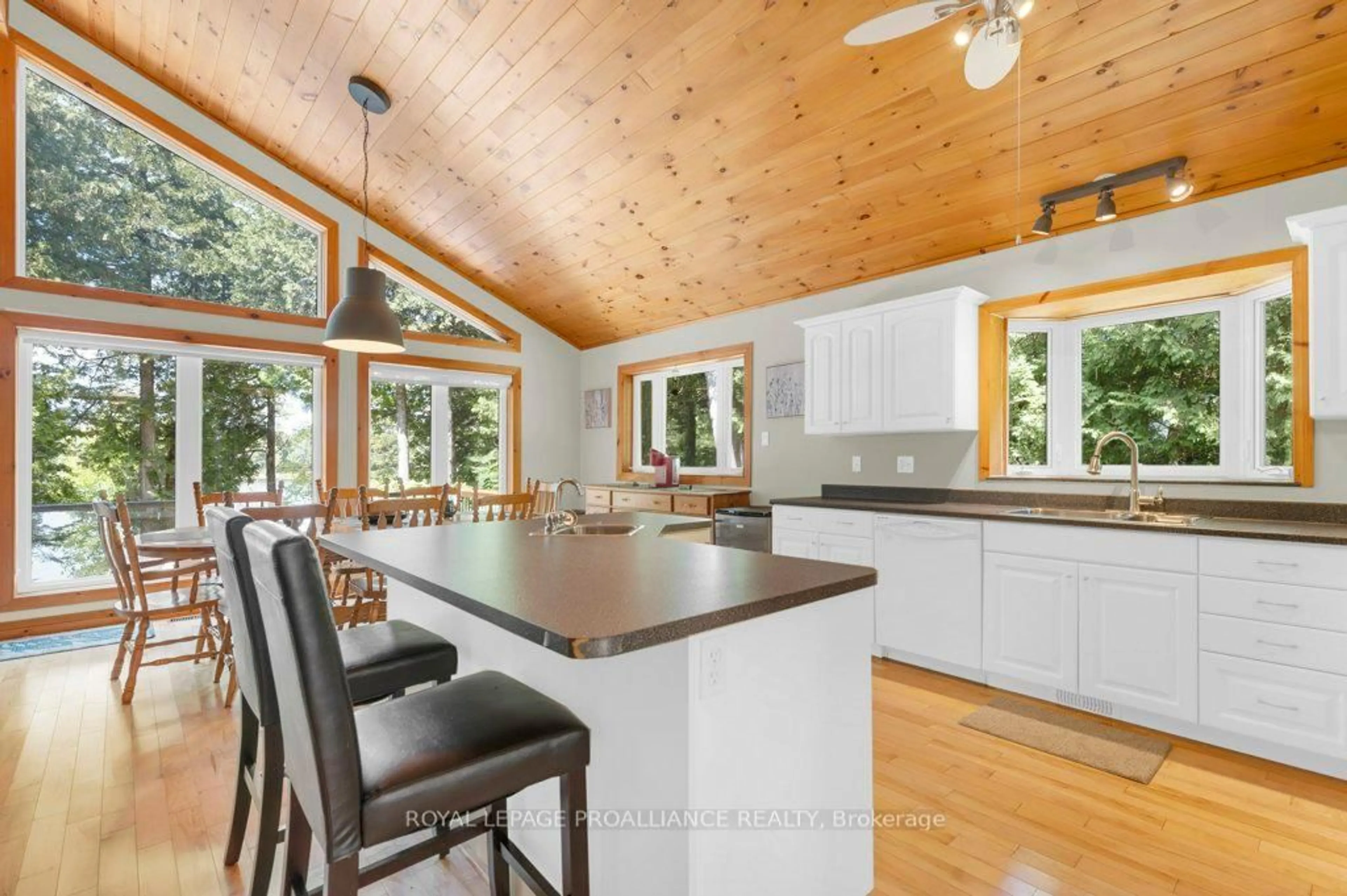 Open concept kitchen, wood/laminate floor for 354 Clear Lake Lane #11, Maberly Ontario K0H 2B0