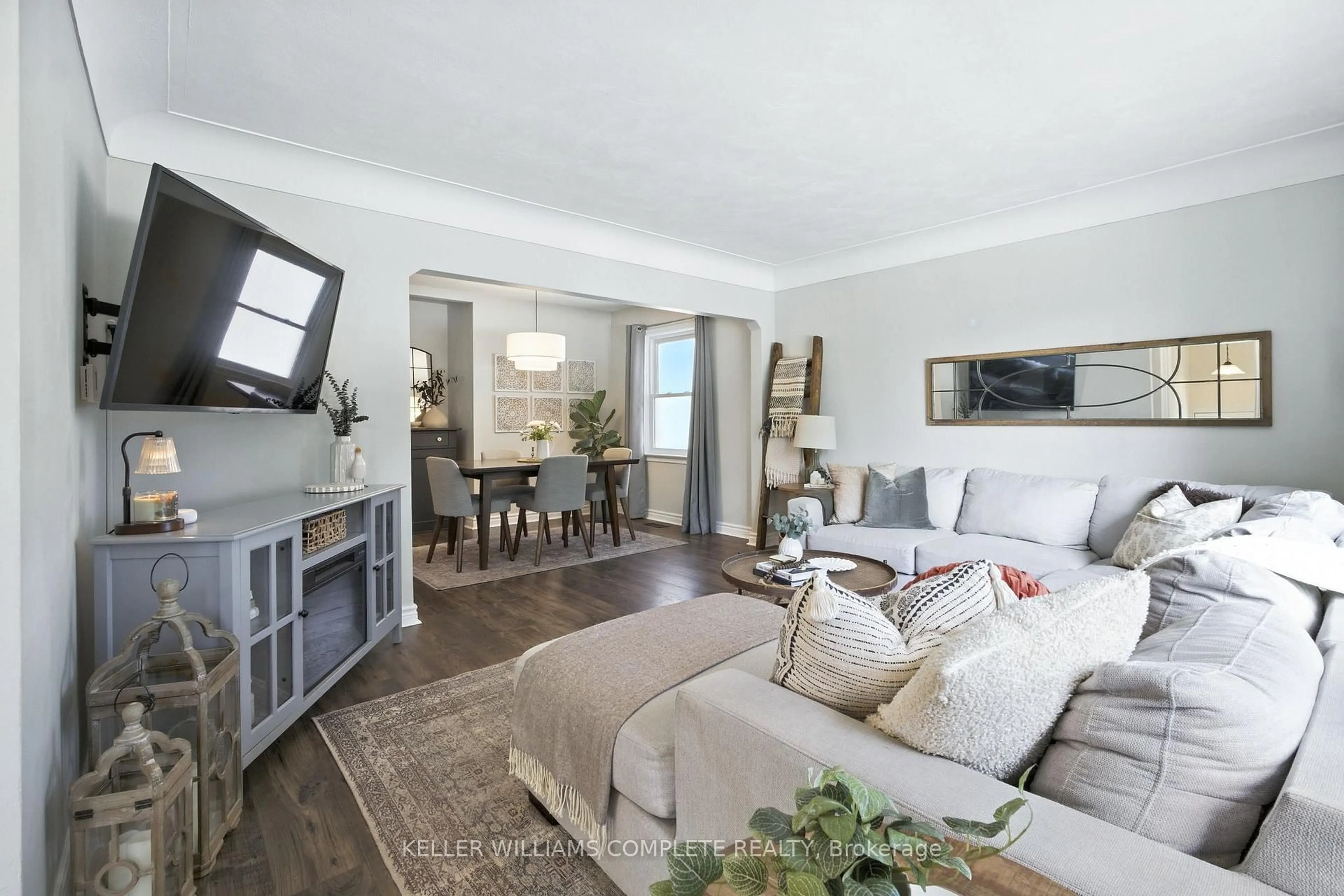 Living room with furniture, wood/laminate floor for 136 West 24th St, Hamilton Ontario L9C 4W4