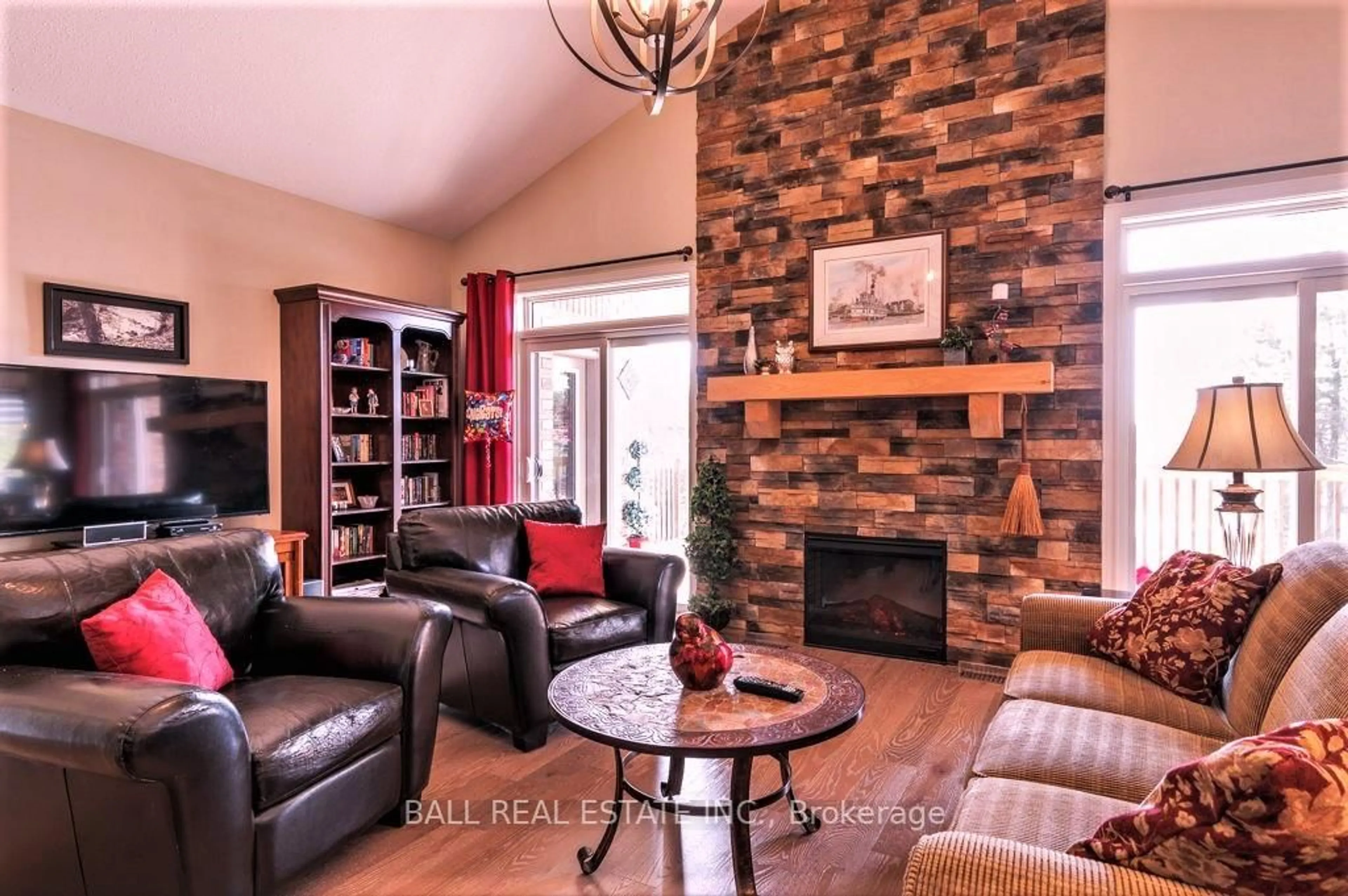 Living room with furniture, wood/laminate floor for 41 South Harbour Dr, Kawartha Lakes Ontario K0M 1A0