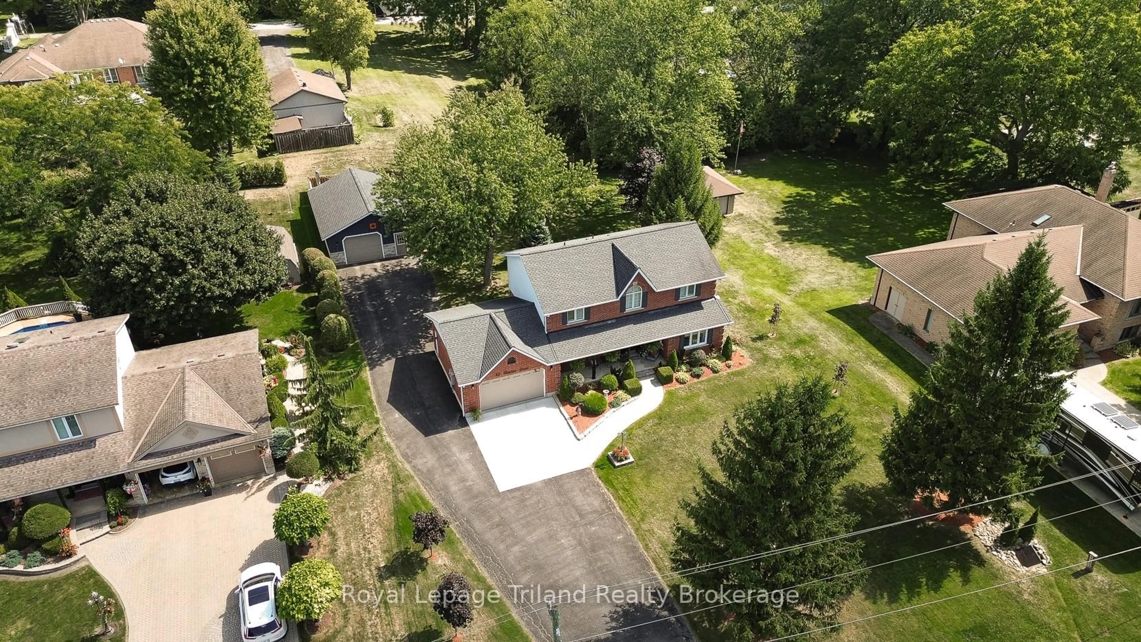 A pic from outside/outdoor area/front of a property/back of a property/a pic from drone, street for 12 Newton St, Zorra Ontario N5C 3J5