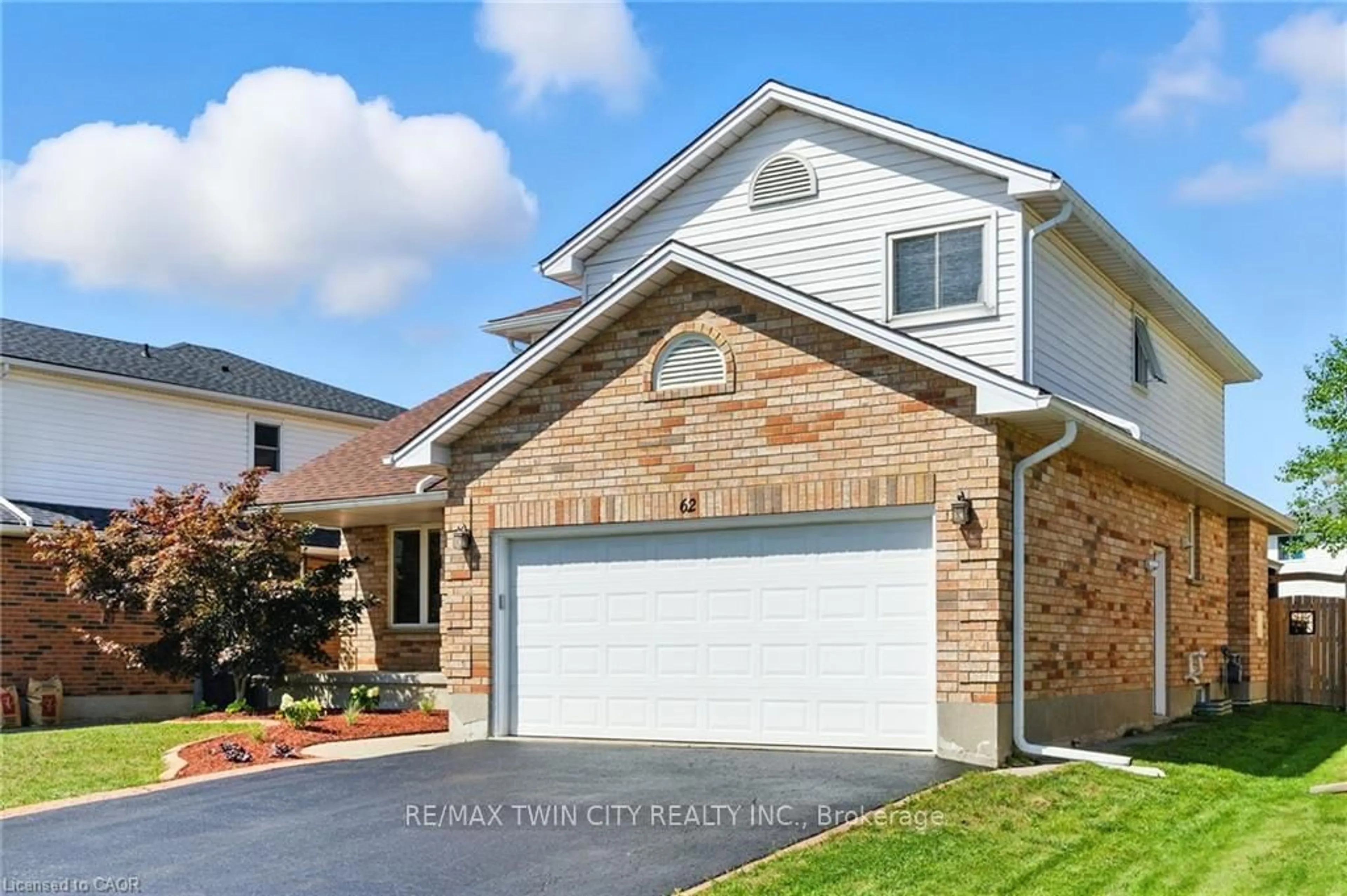 Home with brick exterior material, street for 62 Zeller Dr, Kitchener Ontario N2A 4A9