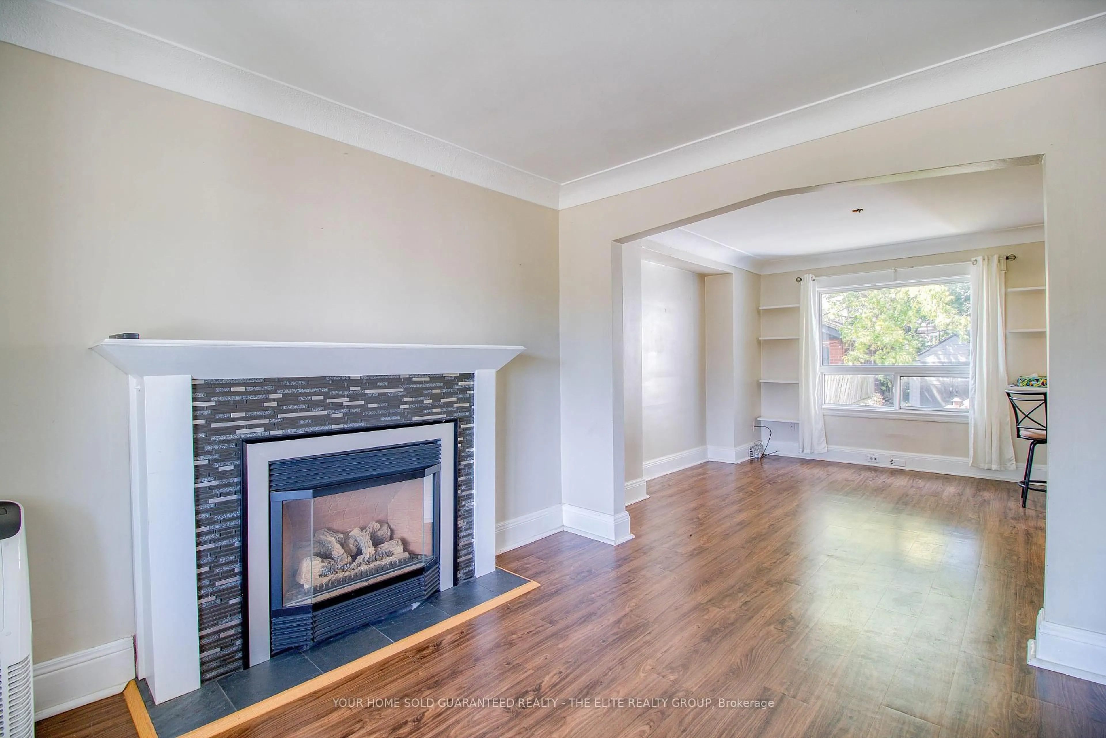 Living room with furniture, wood/laminate floor for 167 Balsam Ave, Hamilton Ontario L8L 6Y4