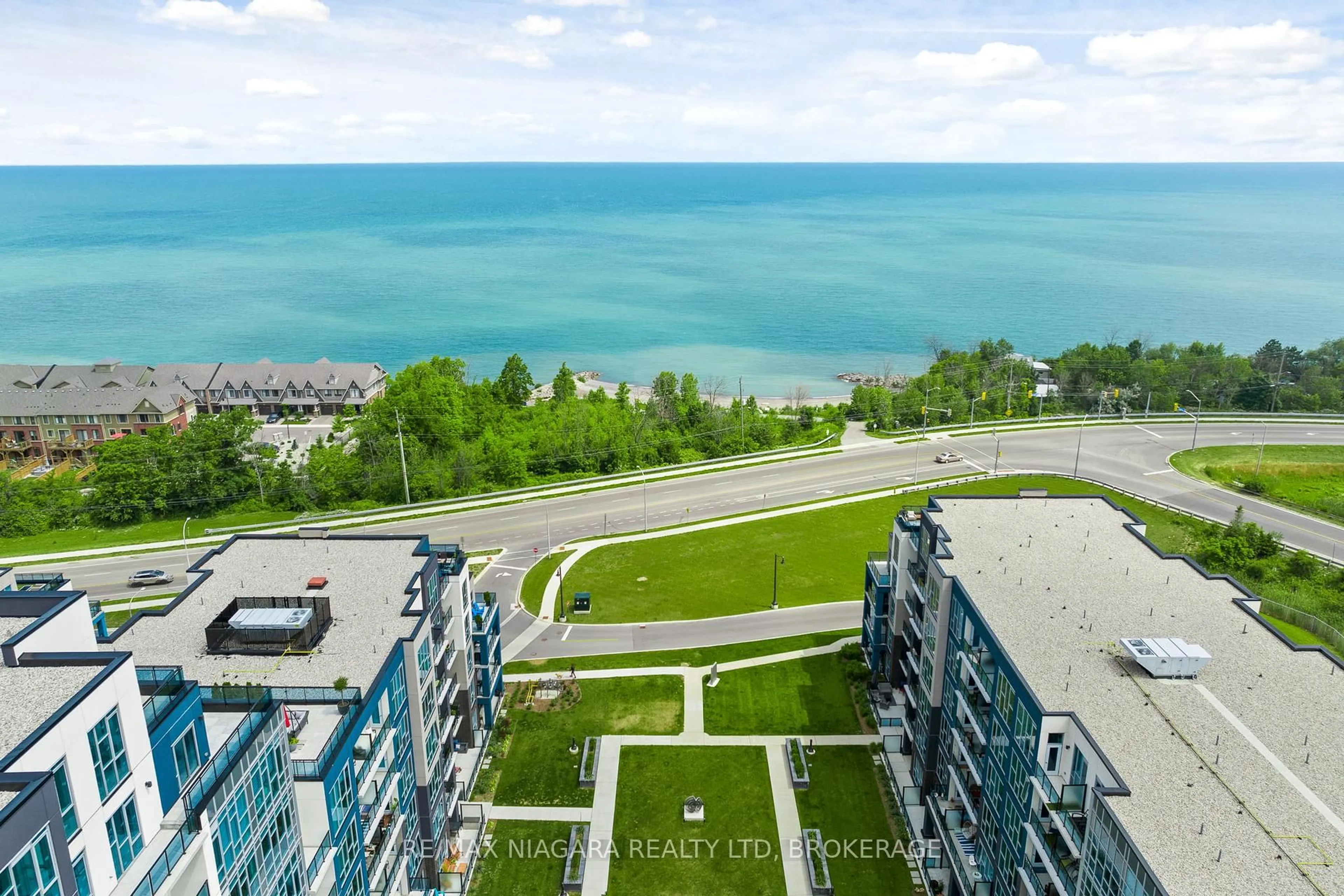 A pic from outside/outdoor area/front of a property/back of a property/a pic from drone, water/lake/river/ocean view for 16 Concord Pl #416, Grimsby Ontario L3M 0J1