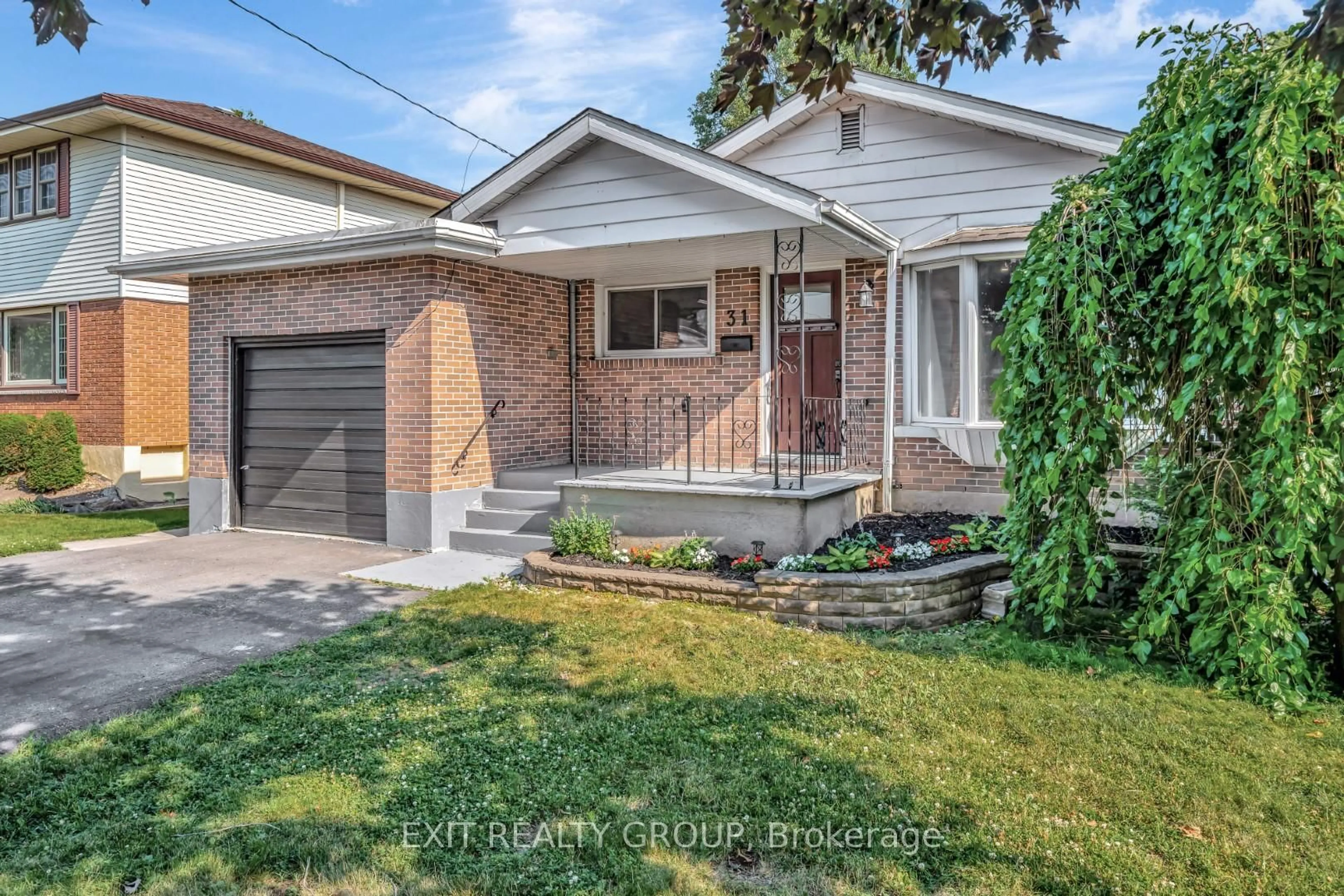 Home with brick exterior material, street for 31 Plaza Sq, Belleville Ontario K8N 4J2