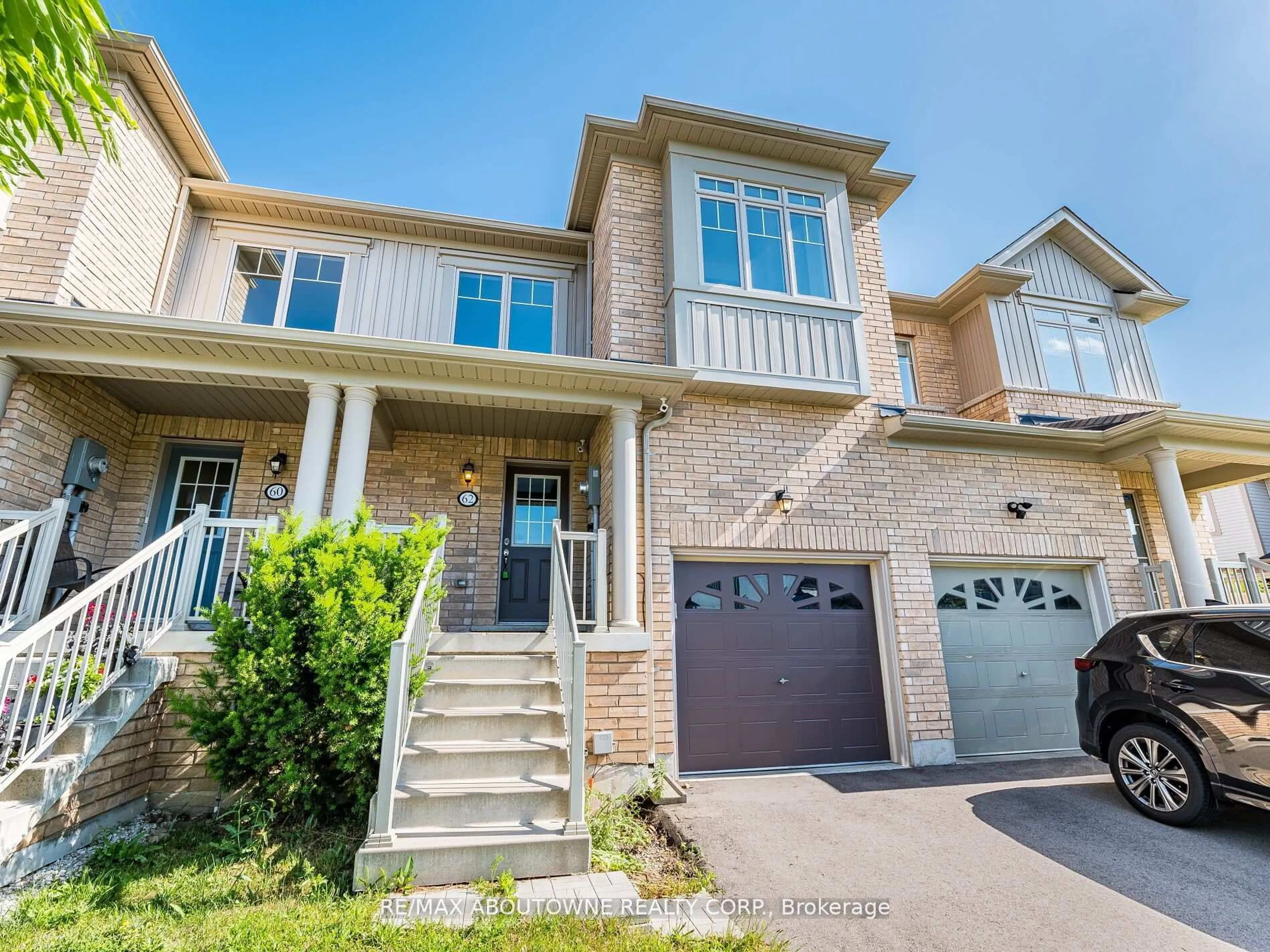Home with brick exterior material, street for 62 Skinner Dr, Guelph Ontario N1E 0E7