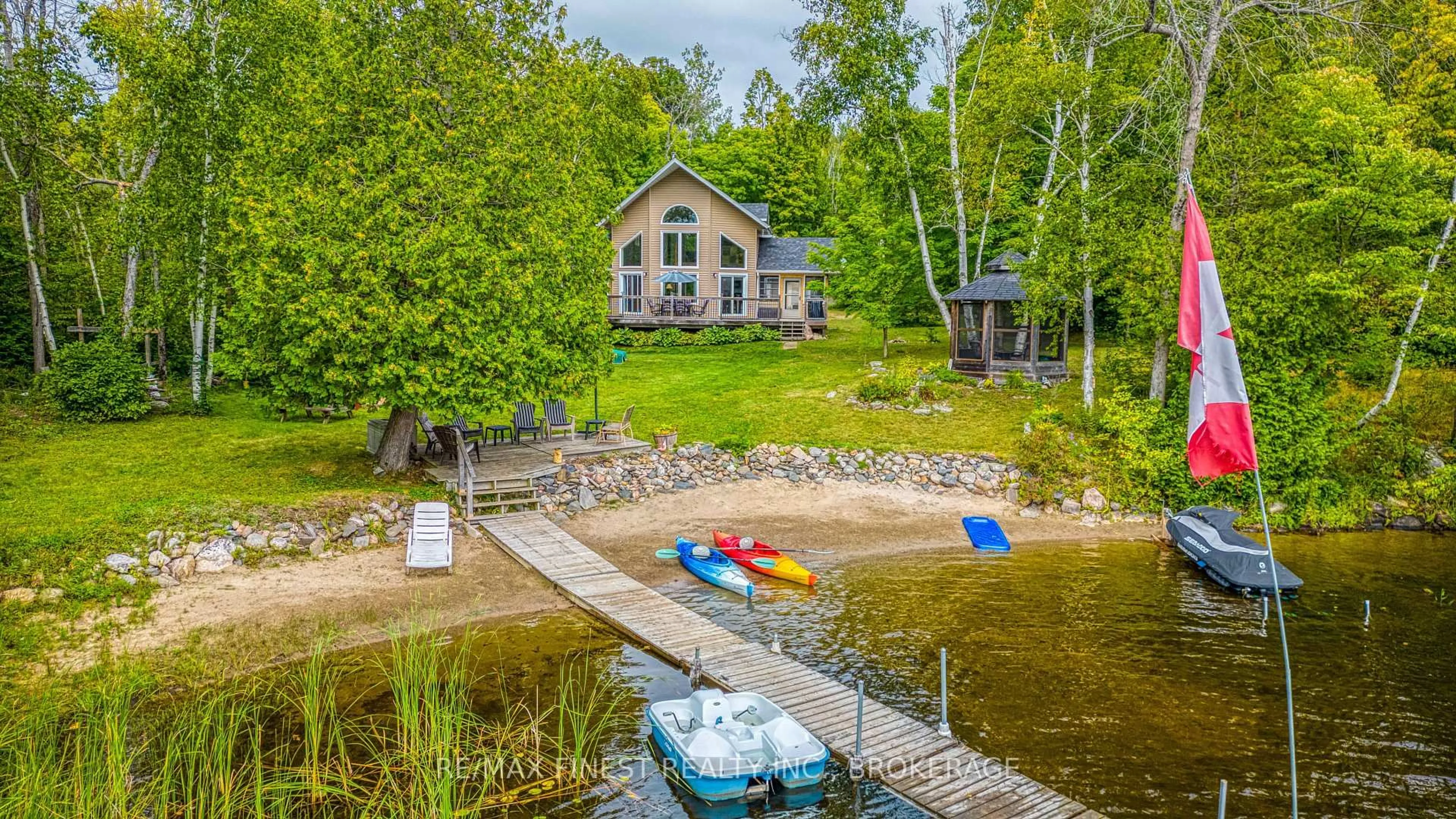 A pic from outside/outdoor area/front of a property/back of a property/a pic from drone, water/lake/river/ocean view for 1602 BAKER VALLEY Rd, Arden Ontario K0H 1B0