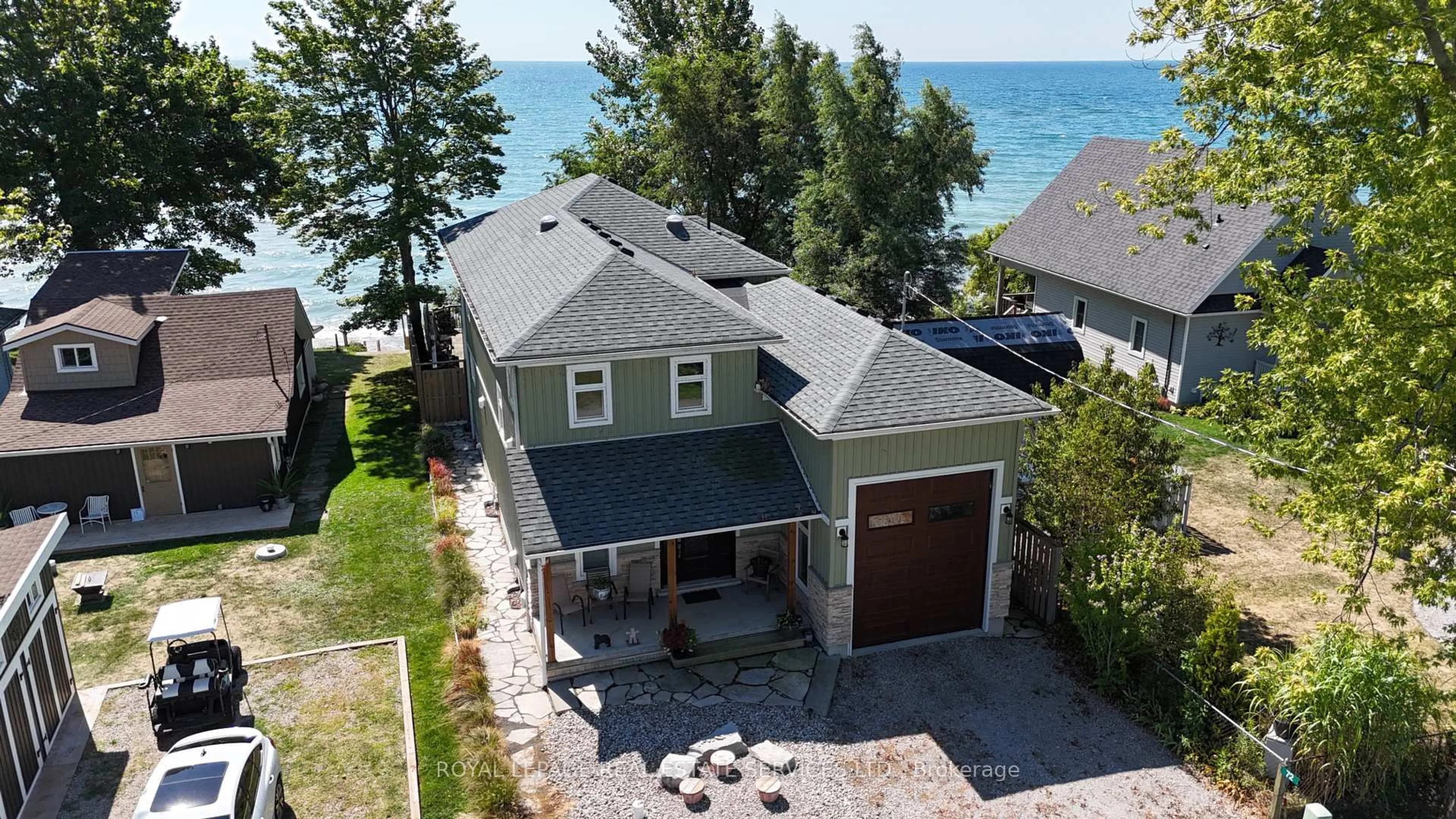 A pic from outside/outdoor area/front of a property/back of a property/a pic from drone, water/lake/river/ocean view for 72 Lakeside Dr, Haldimand Ontario N0A 1L0