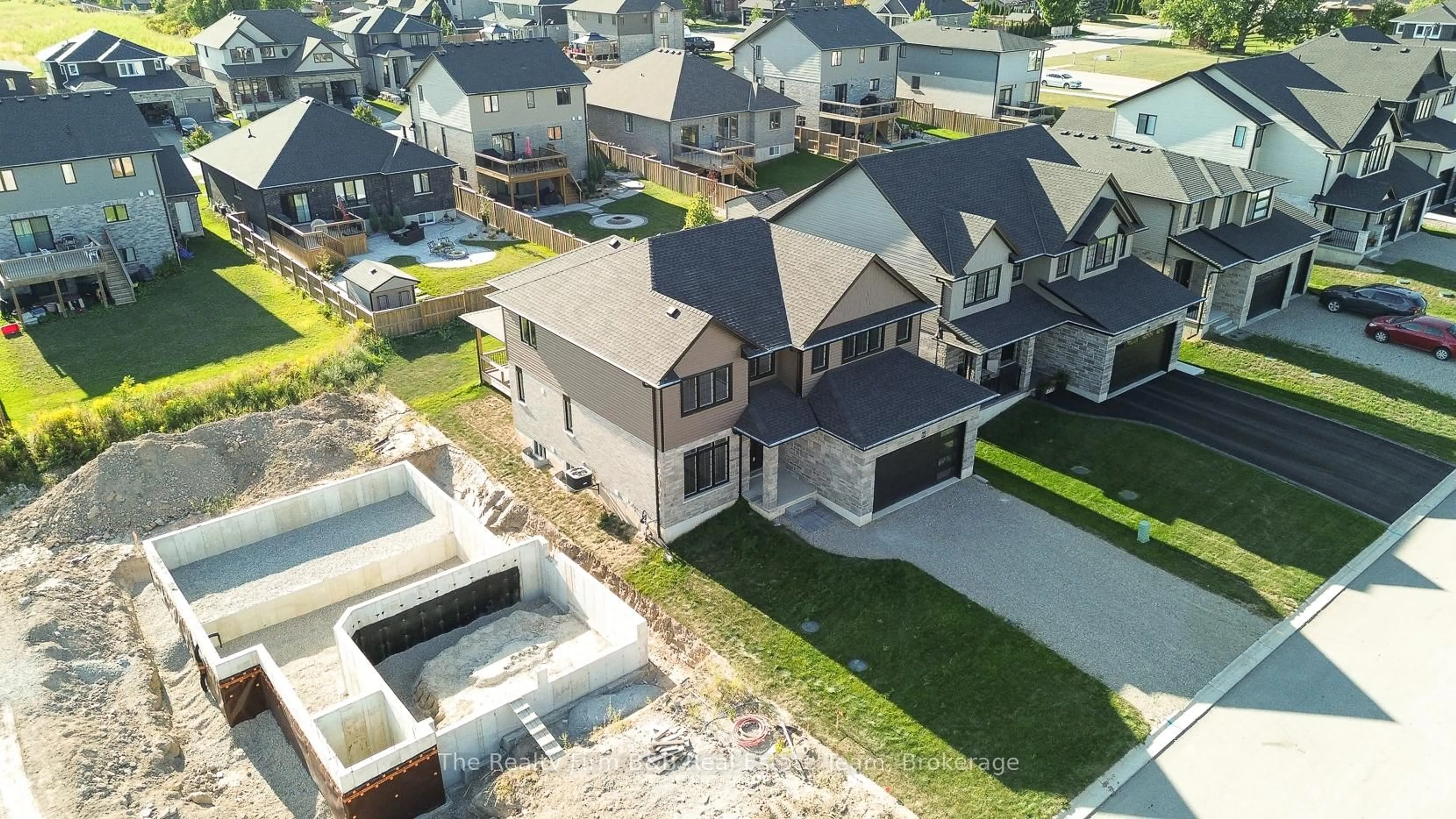 A pic from outside/outdoor area/front of a property/back of a property/a pic from drone, street for 100 GRAYDON Dr, South-West Oxford Ontario N0J 1N0
