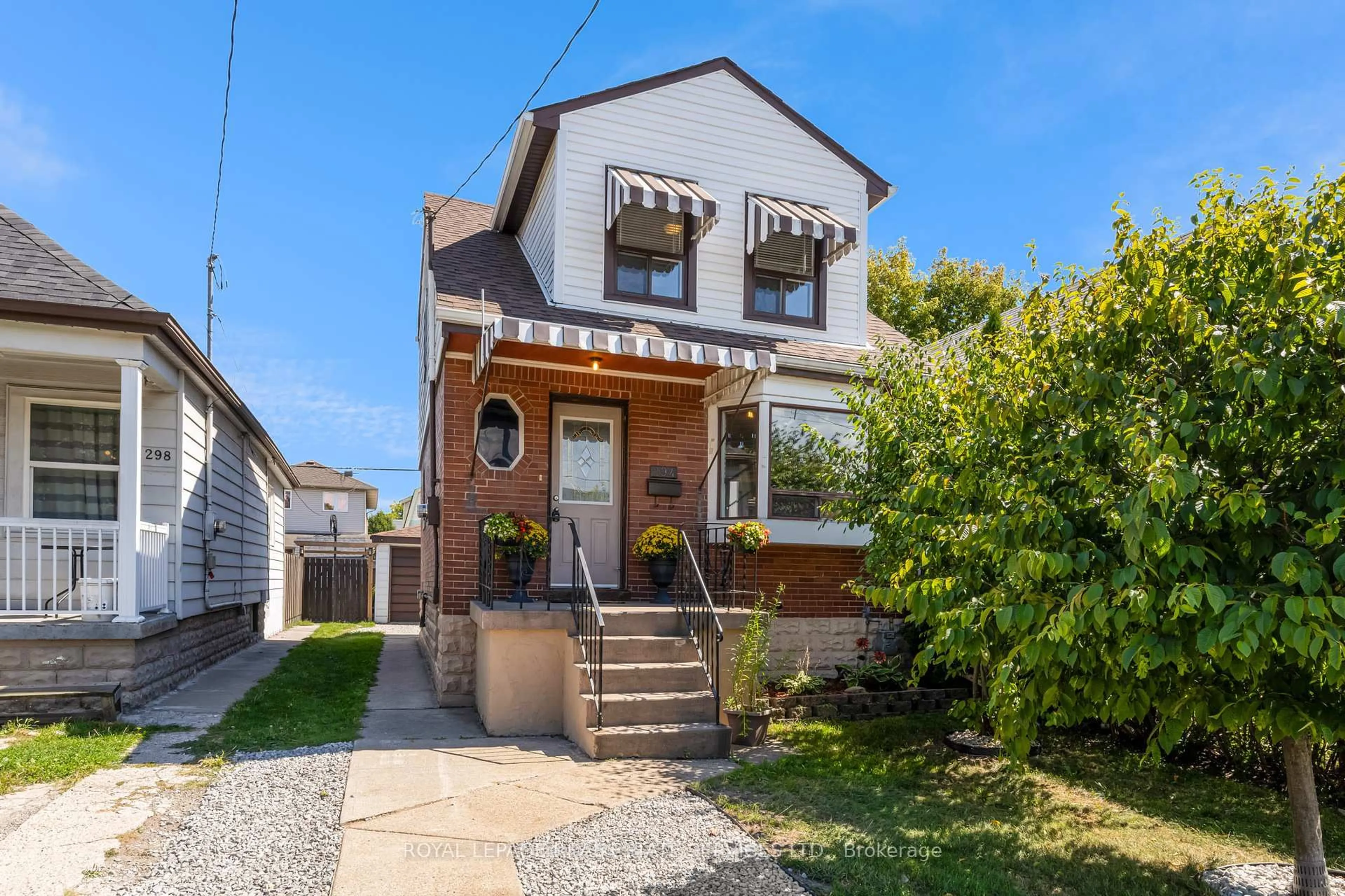 Home with brick exterior material, street for 294 Cope St, Hamilton Ontario L8H 5B5