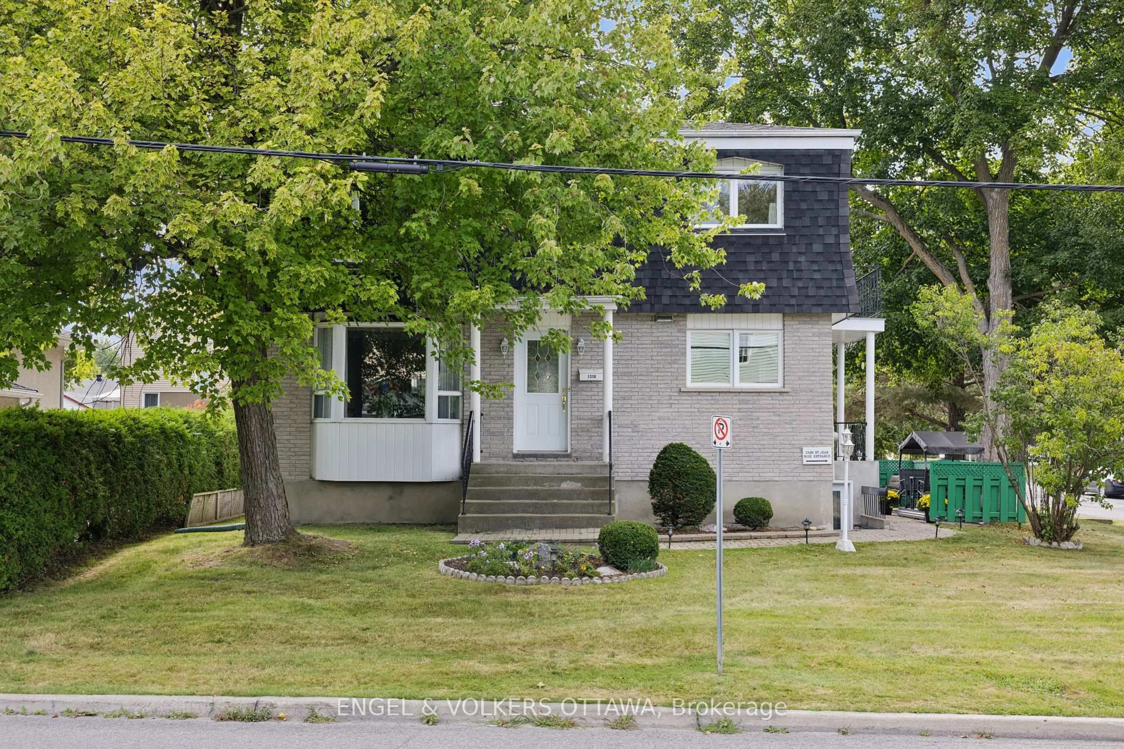 Home with brick exterior material, street for 1318 St Jean St, Orleans Ontario K1C 1N8