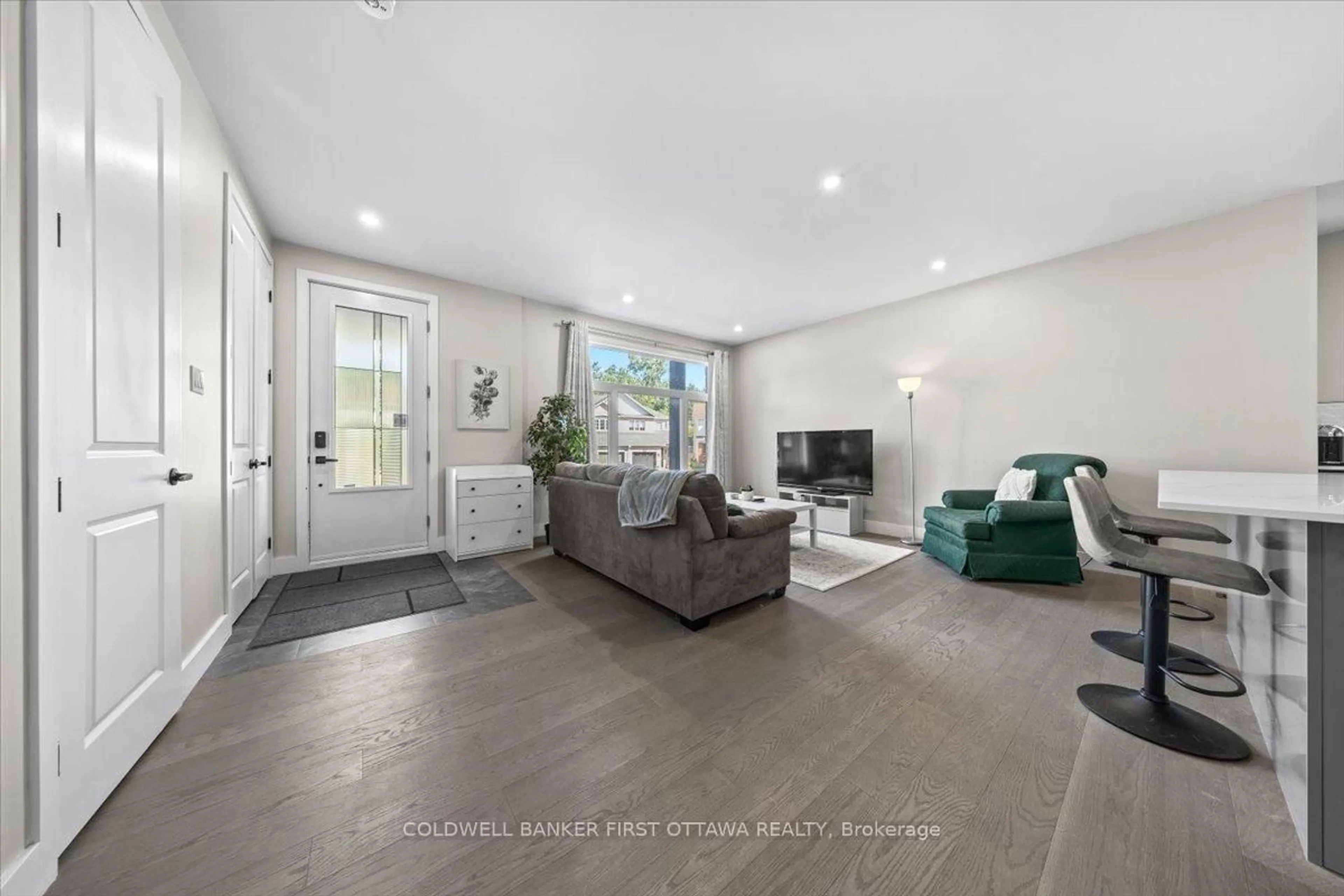 Living room with furniture, unknown for 22 Inverkip Ave #A/B, Ottawa Ontario K1T 4B7