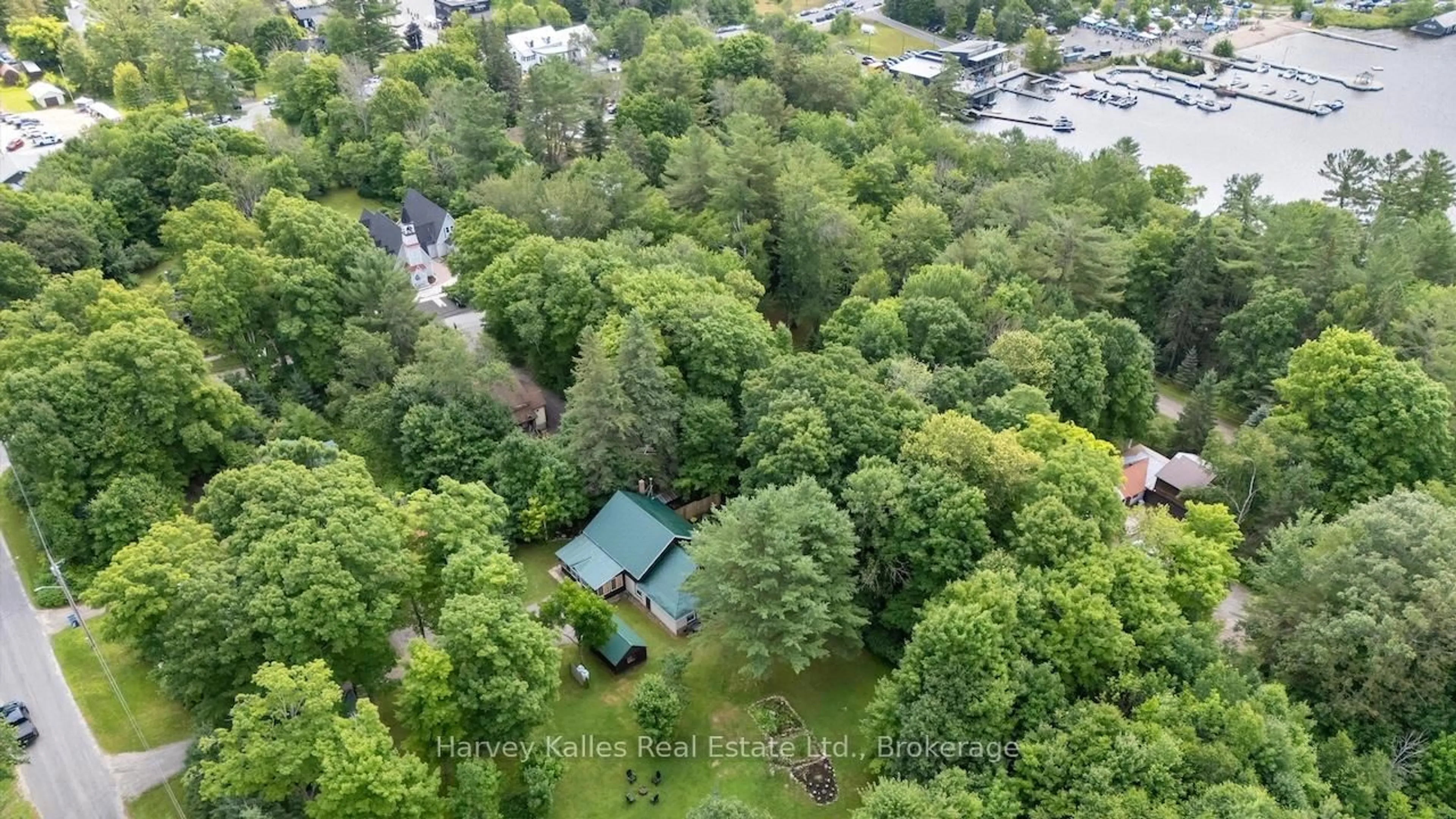 A pic from outside/outdoor area/front of a property/back of a property/a pic from drone, forest/trees view for 15 Victoria St, Seguin Ontario P0C 1J0