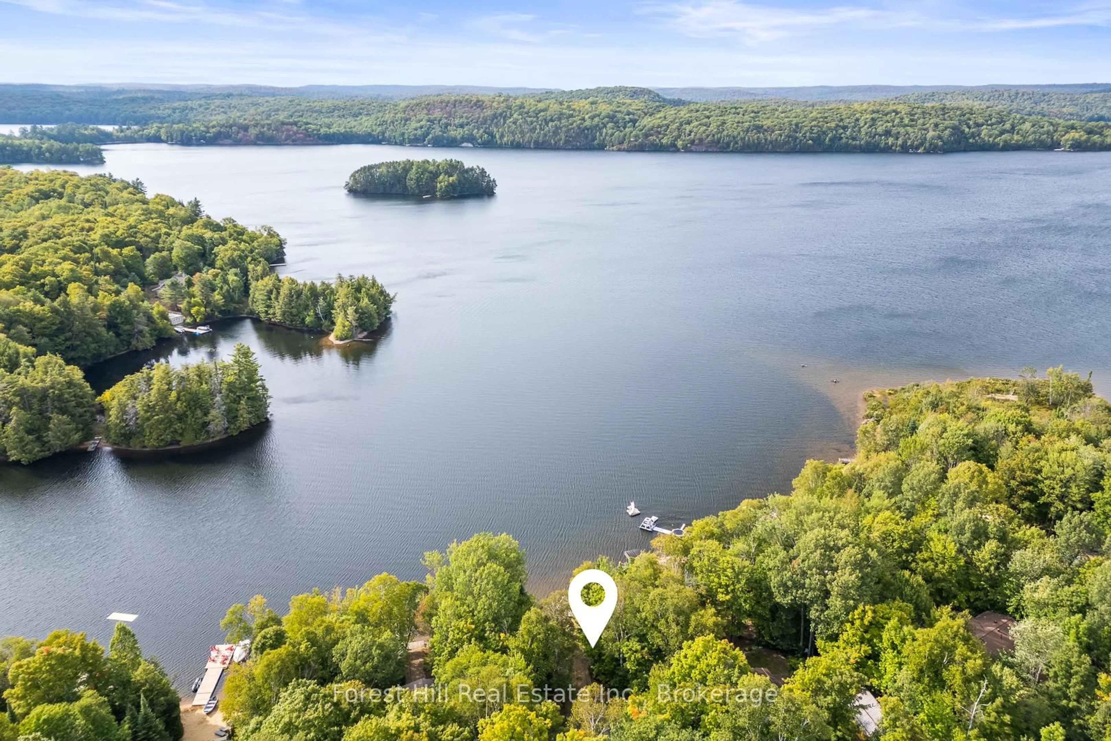 A pic from outside/outdoor area/front of a property/back of a property/a pic from drone, water/lake/river/ocean view for 3991 Kawagama Lake Rd, Algonquin Highlands Ontario P0A 1E0