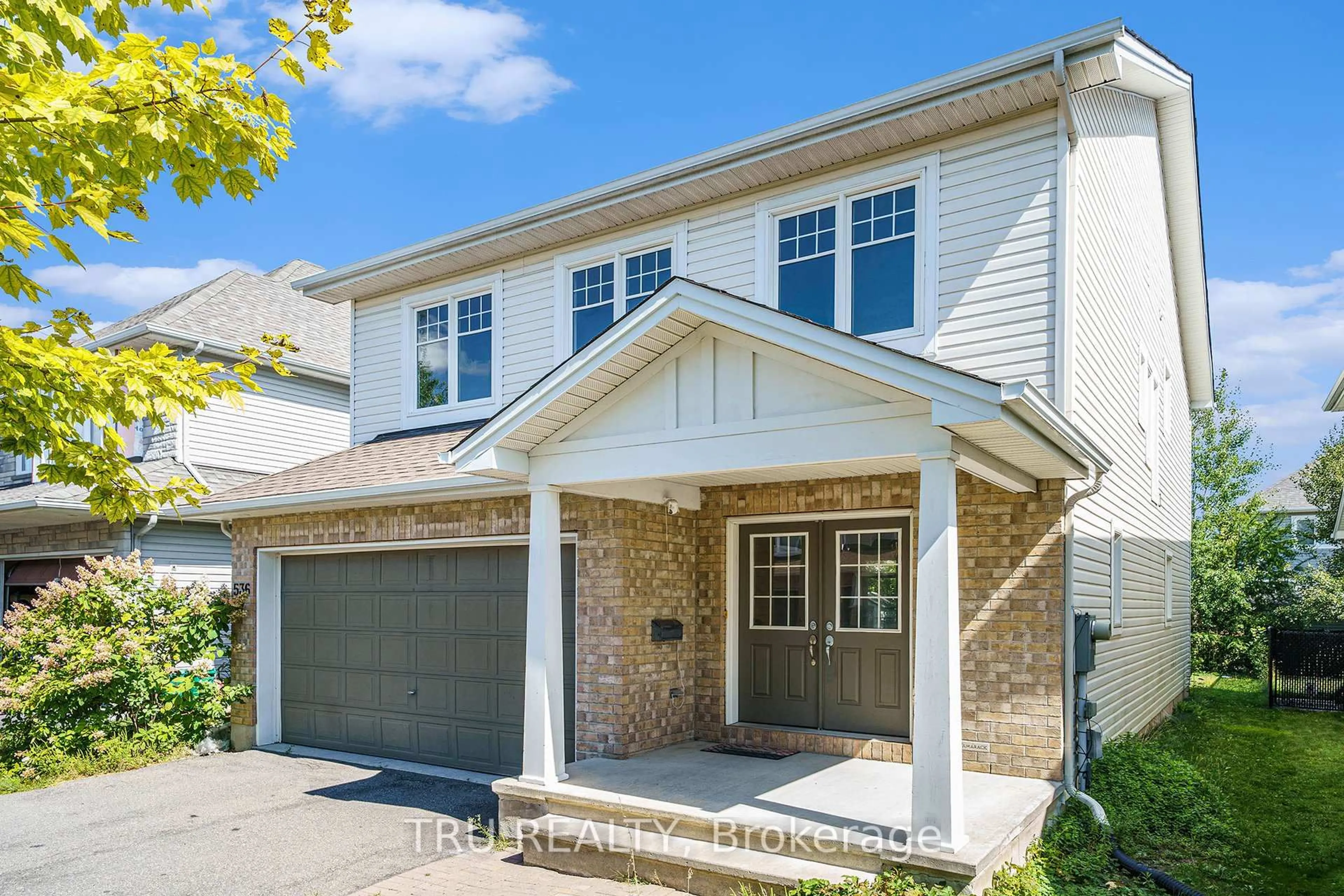 Home with brick exterior material, street for 536 Golden Sedge Way, Ottawa Ontario K1T 0G5