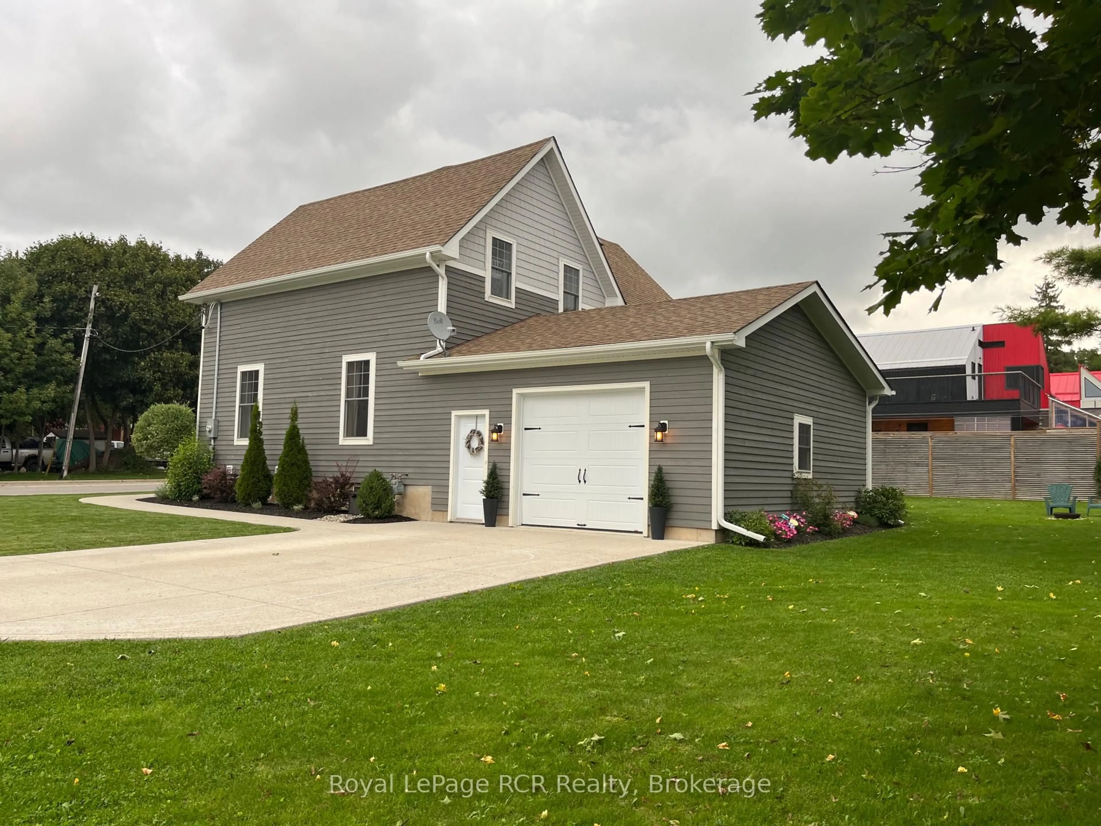 Home with vinyl exterior material, street for 39 John St, Arran-Elderslie Ontario N0H 2N0