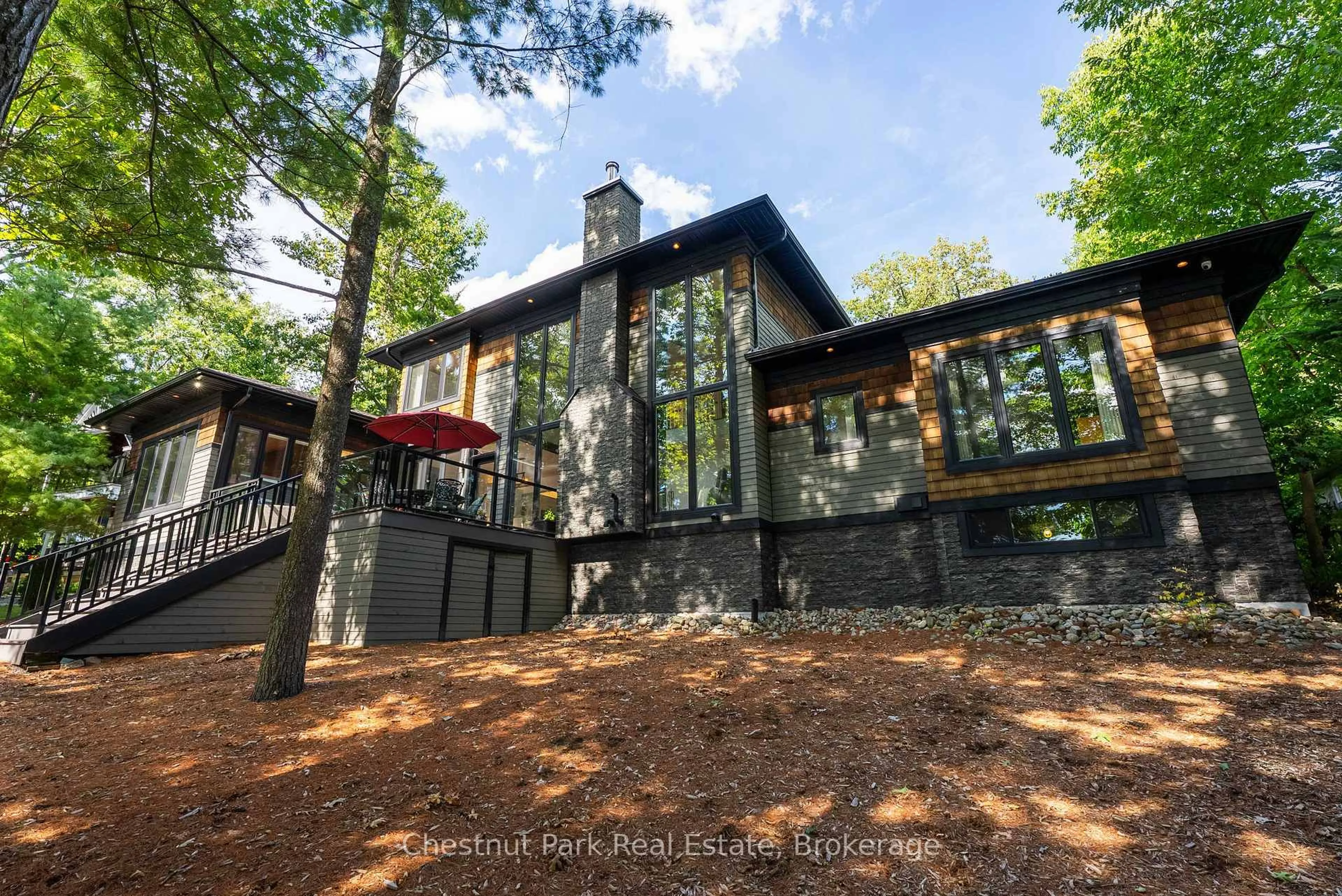 Home with brick exterior material, forest/trees view for 1030A Gordon St, Muskoka Lakes Ontario P0C 1A0