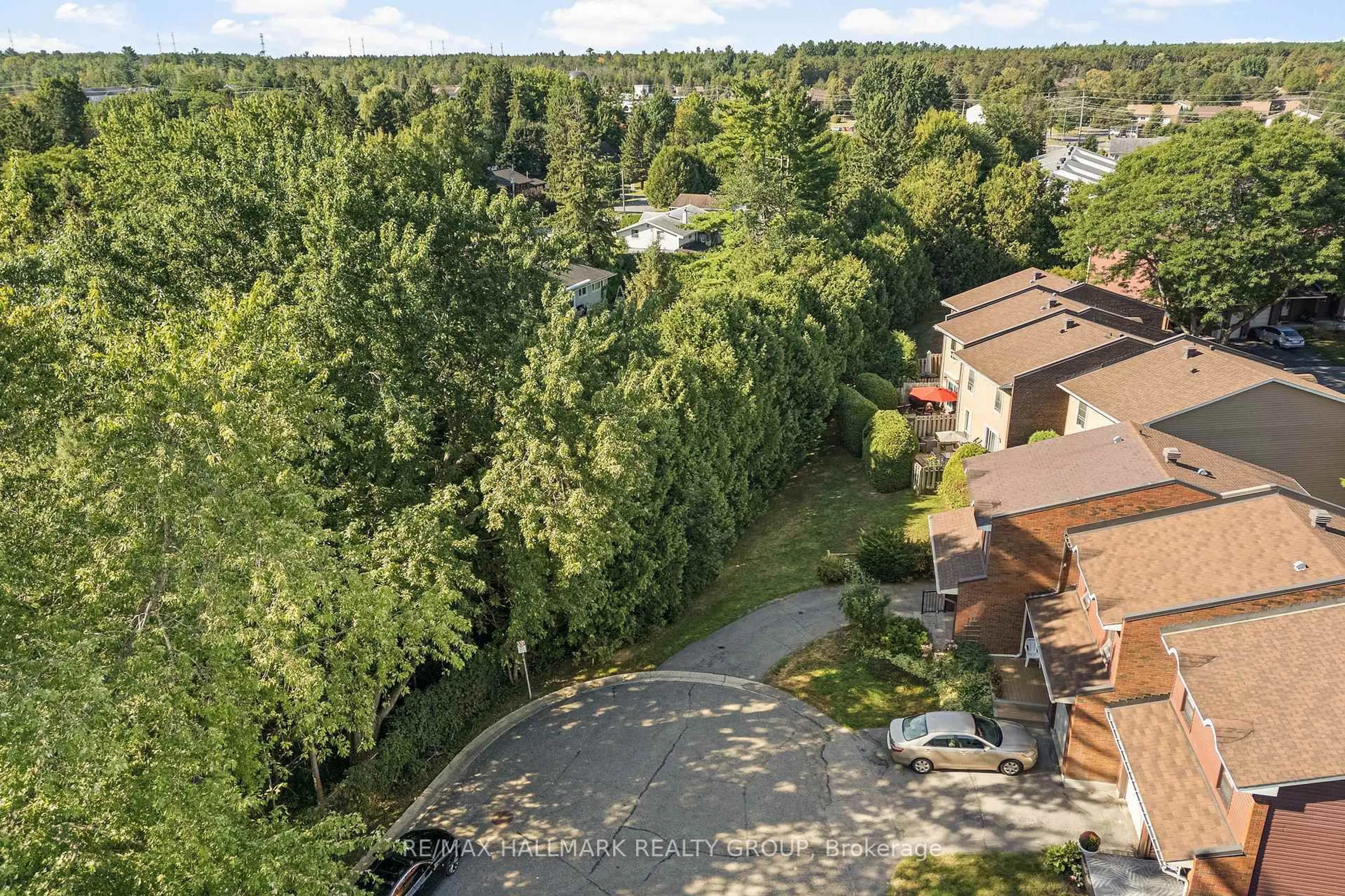 A pic from outside/outdoor area/front of a property/back of a property/a pic from drone, forest/trees view for 26 C Arnold Dr, Ottawa Ontario K2H 6V9