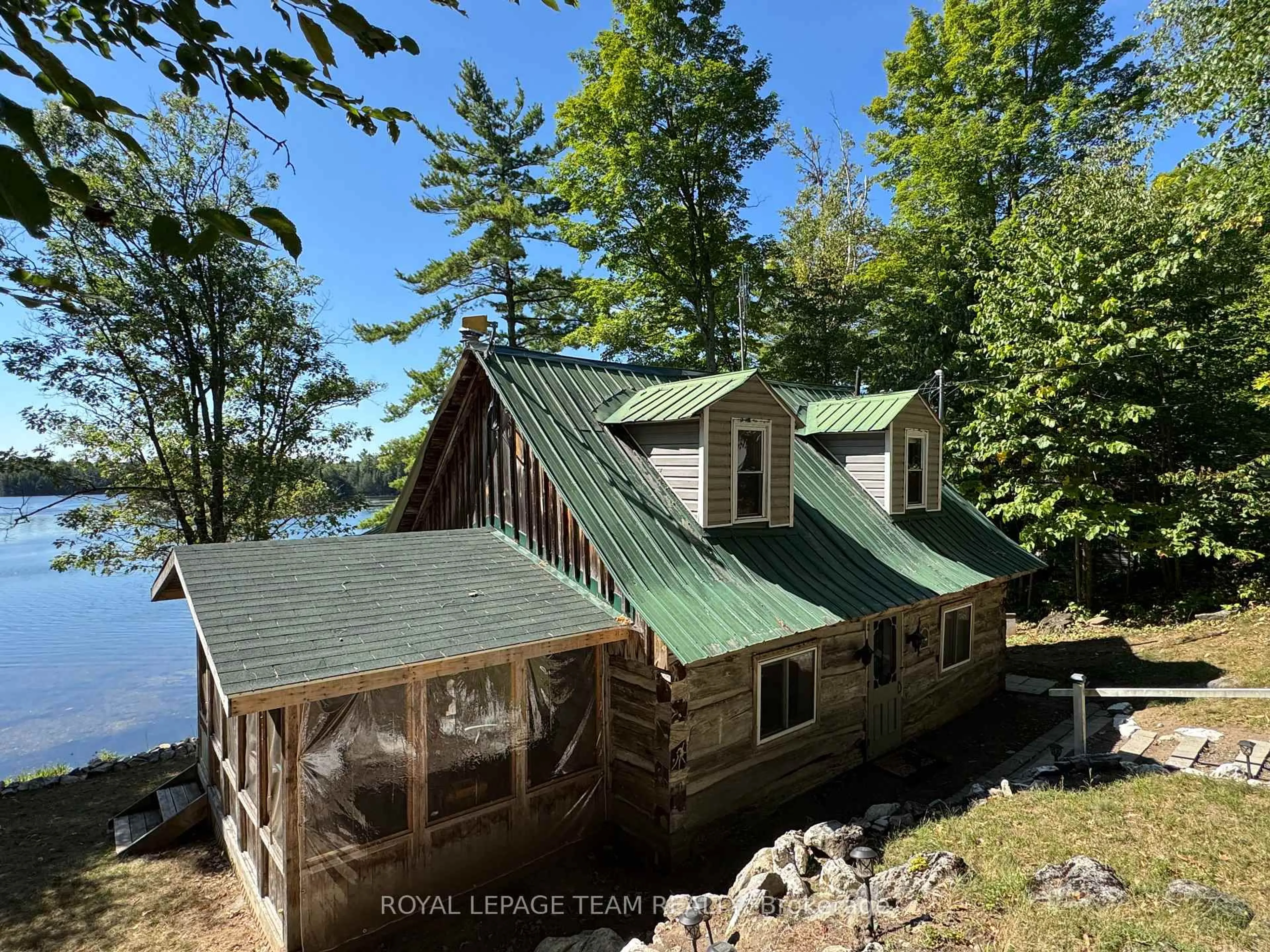 A pic from outside/outdoor area/front of a property/back of a property/a pic from drone, water/lake/river/ocean view for 429 Hardwood Ridge Rd, Lanark Ontario K0G 1K0