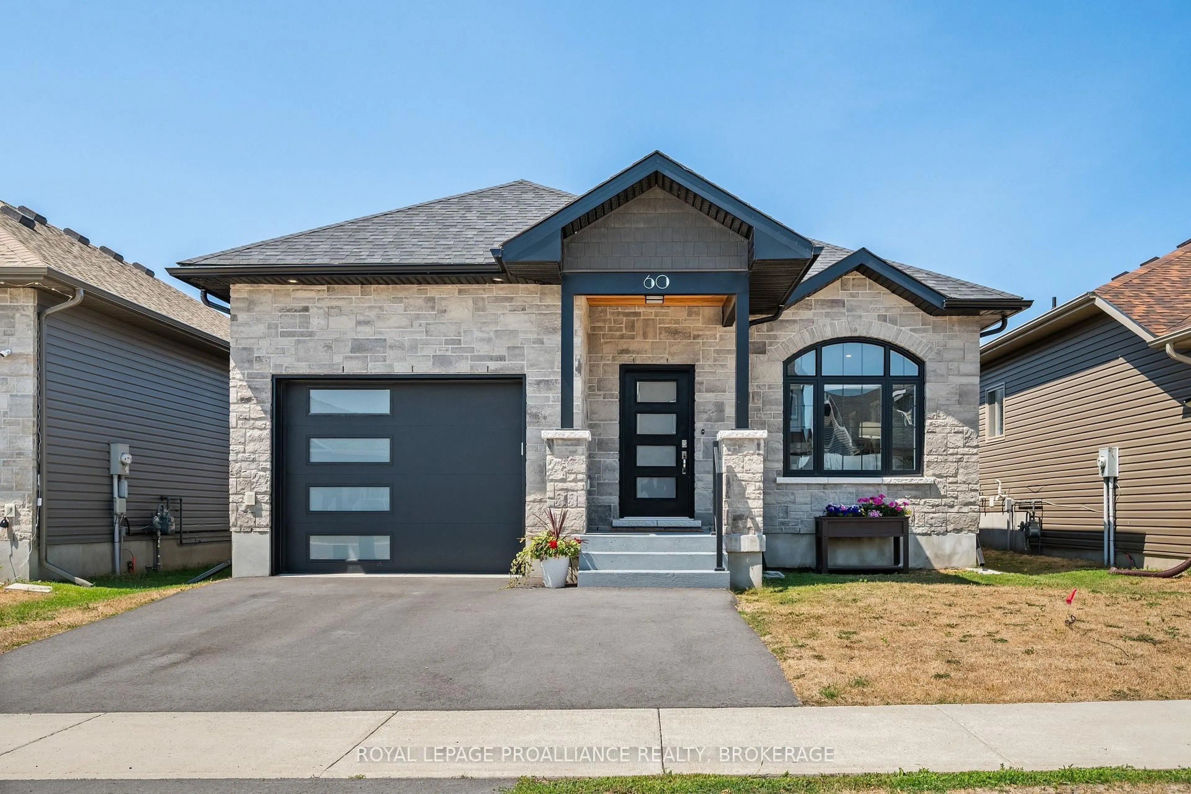 Home with brick exterior material, street for 60 Potter Dr, Bissett Creek Ontario K0H 2H0