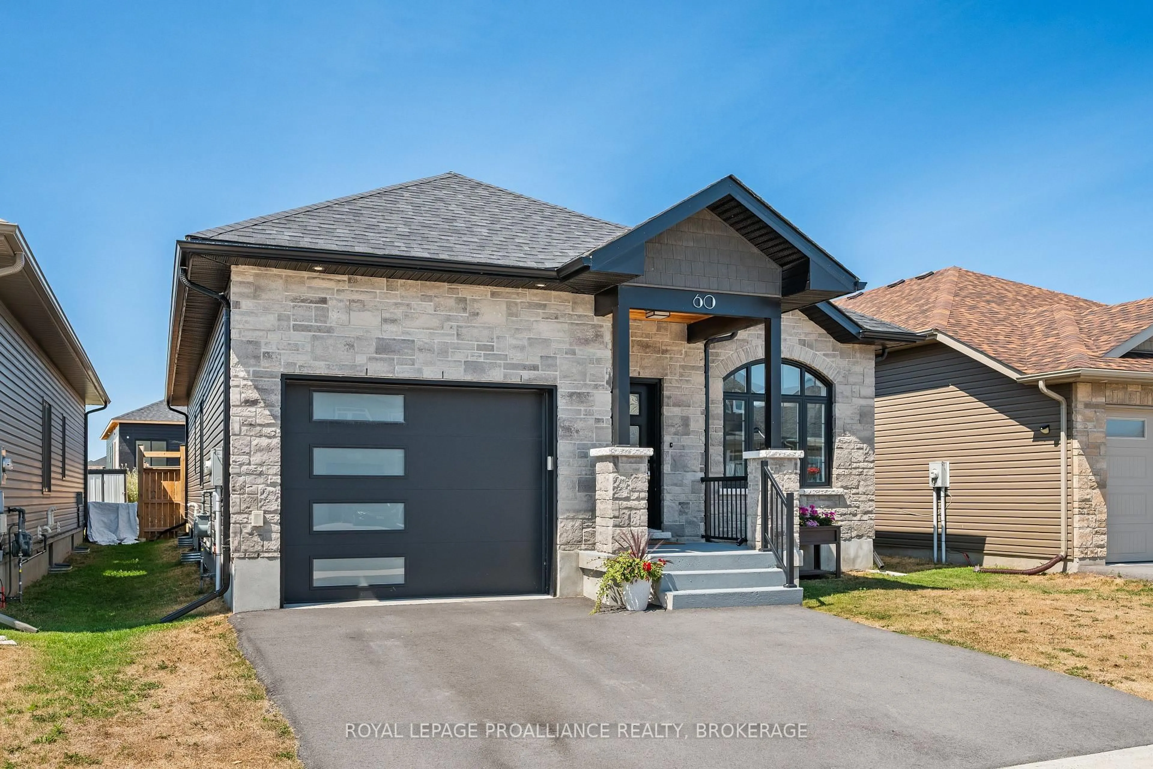 Home with brick exterior material, street for 60 Potter Dr, Bissett Creek Ontario K0H 2H0