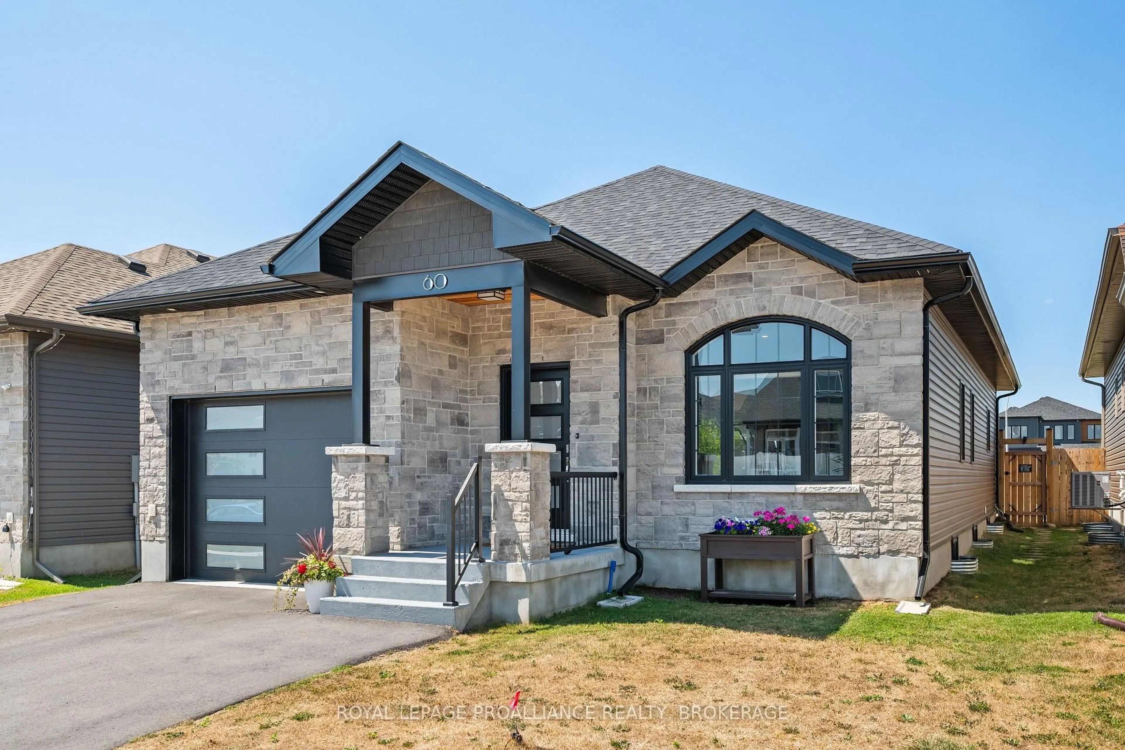 Home with brick exterior material, street for 60 Potter Dr, Bissett Creek Ontario K0H 2H0