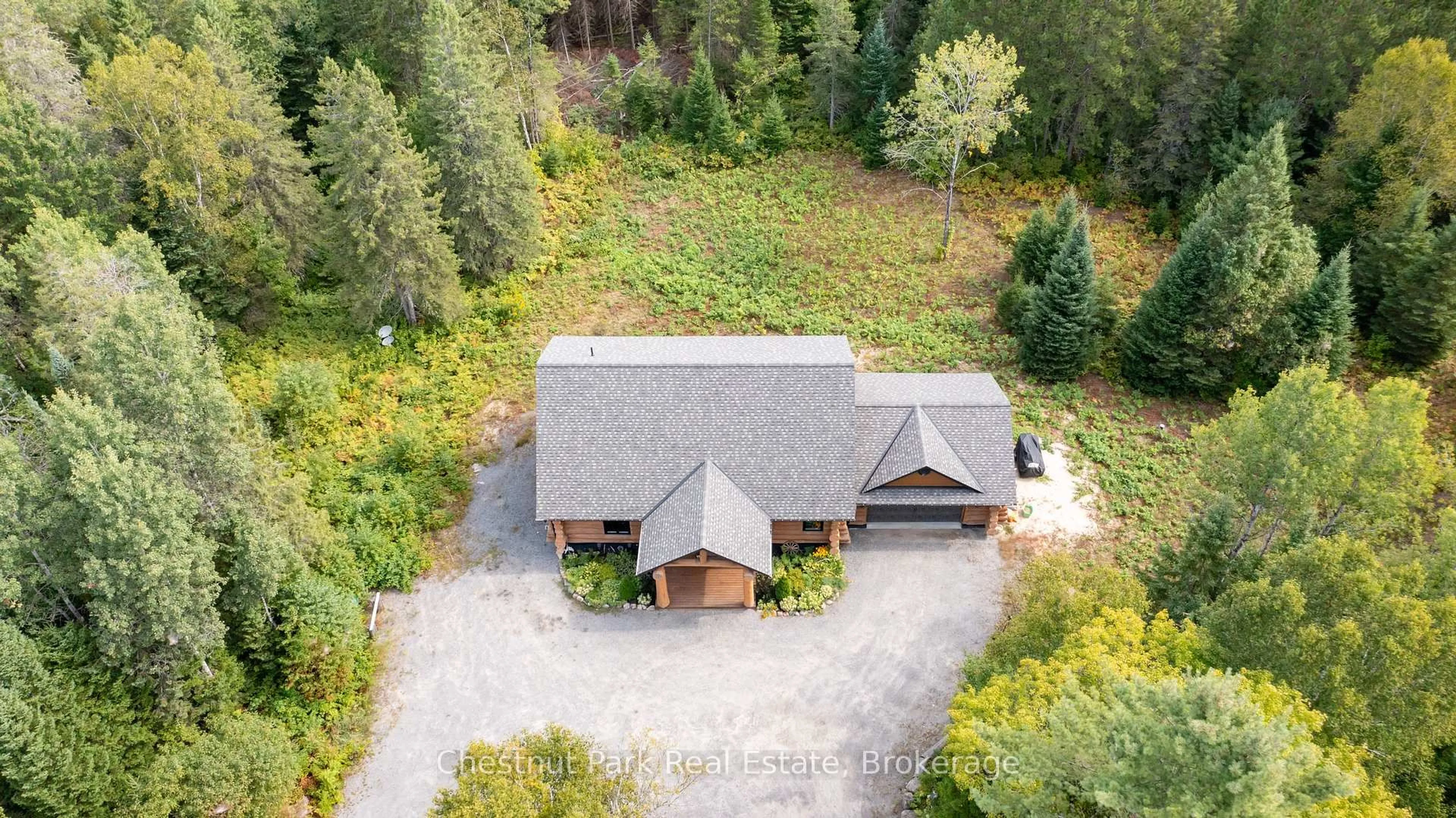 A pic from outside/outdoor area/front of a property/back of a property/a pic from drone, unknown for 1363 Williamsport Rd, Huntsville Ontario P1H 2J4