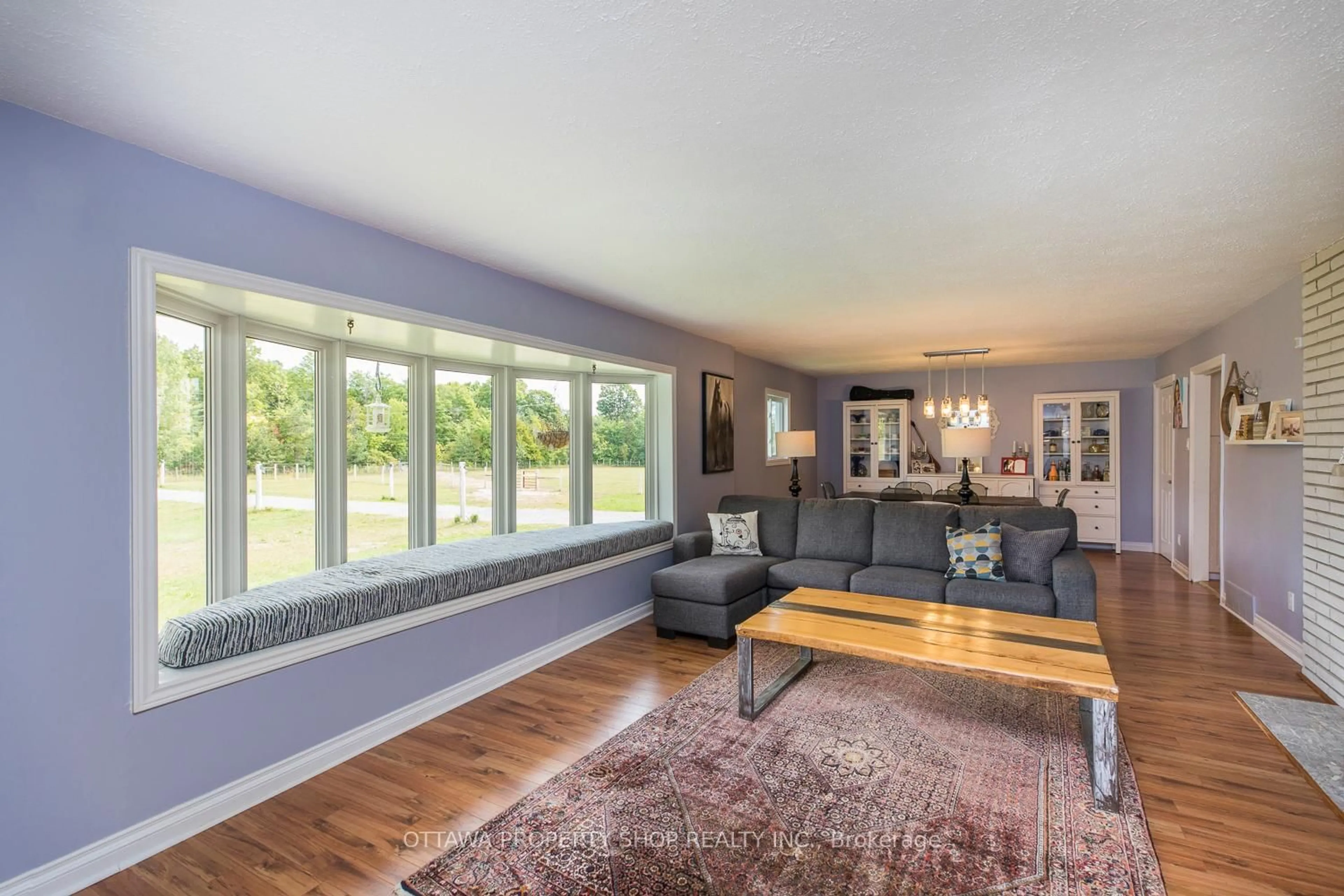 Living room with furniture, unknown for 2428 Greys Creek Rd, Ottawa Ontario K4P 1N7