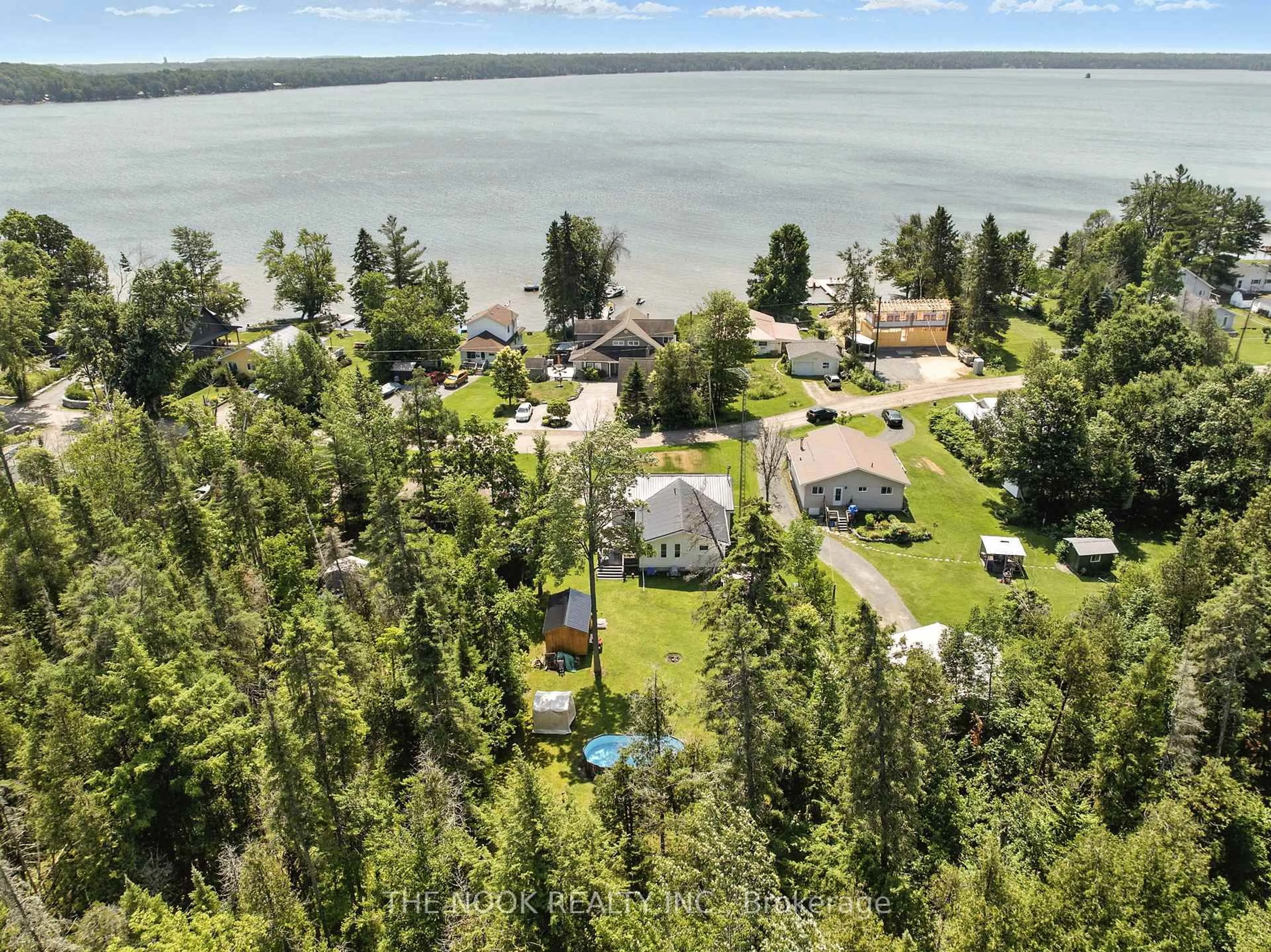 A pic from outside/outdoor area/front of a property/back of a property/a pic from drone, water/lake/river/ocean view for 104 Peepy Horn Rd, Limoges Ontario K0K 2M0