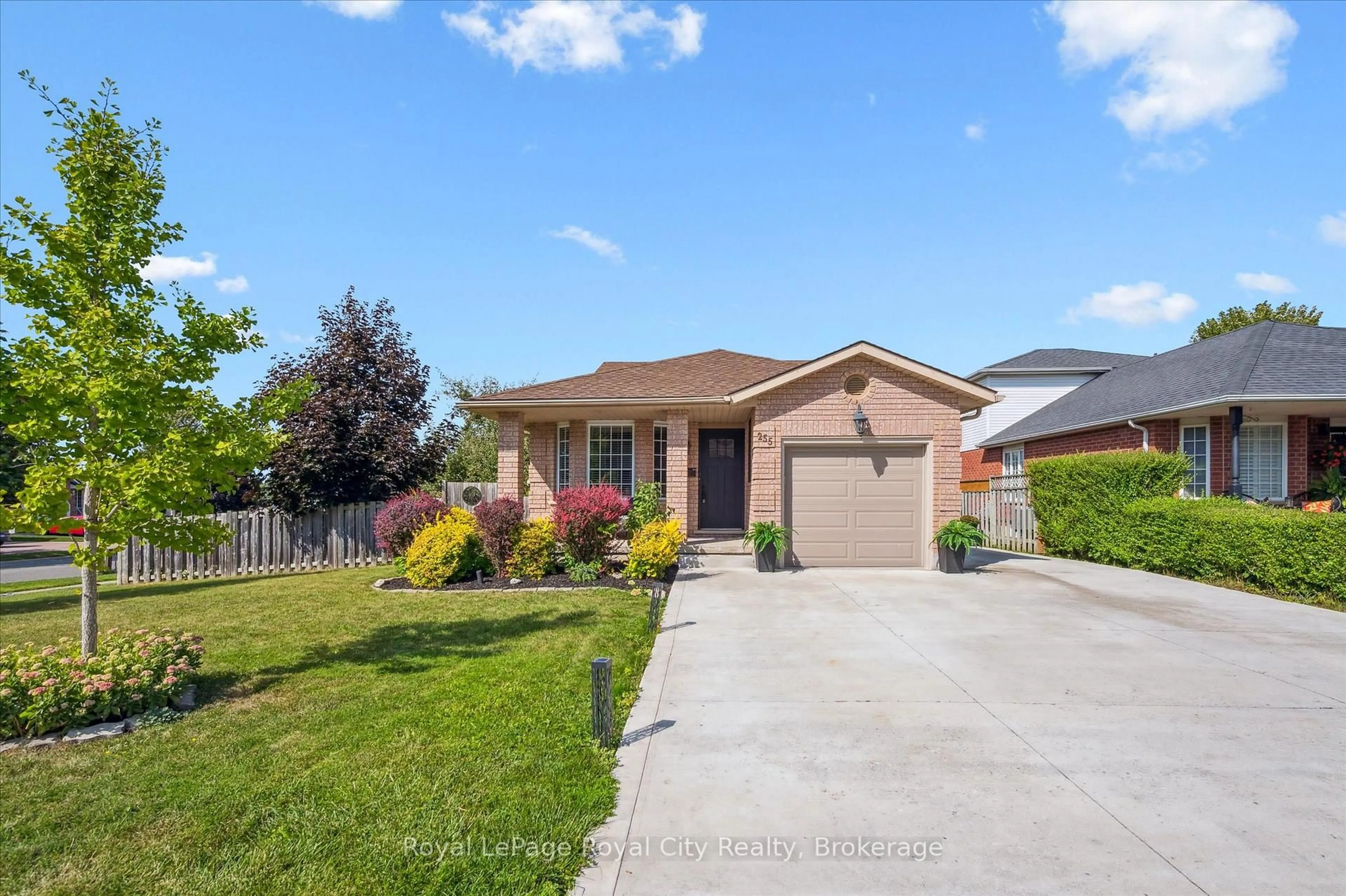 Home with brick exterior material, street for 255 Deerpath Dr, Guelph Ontario N1K 1T8