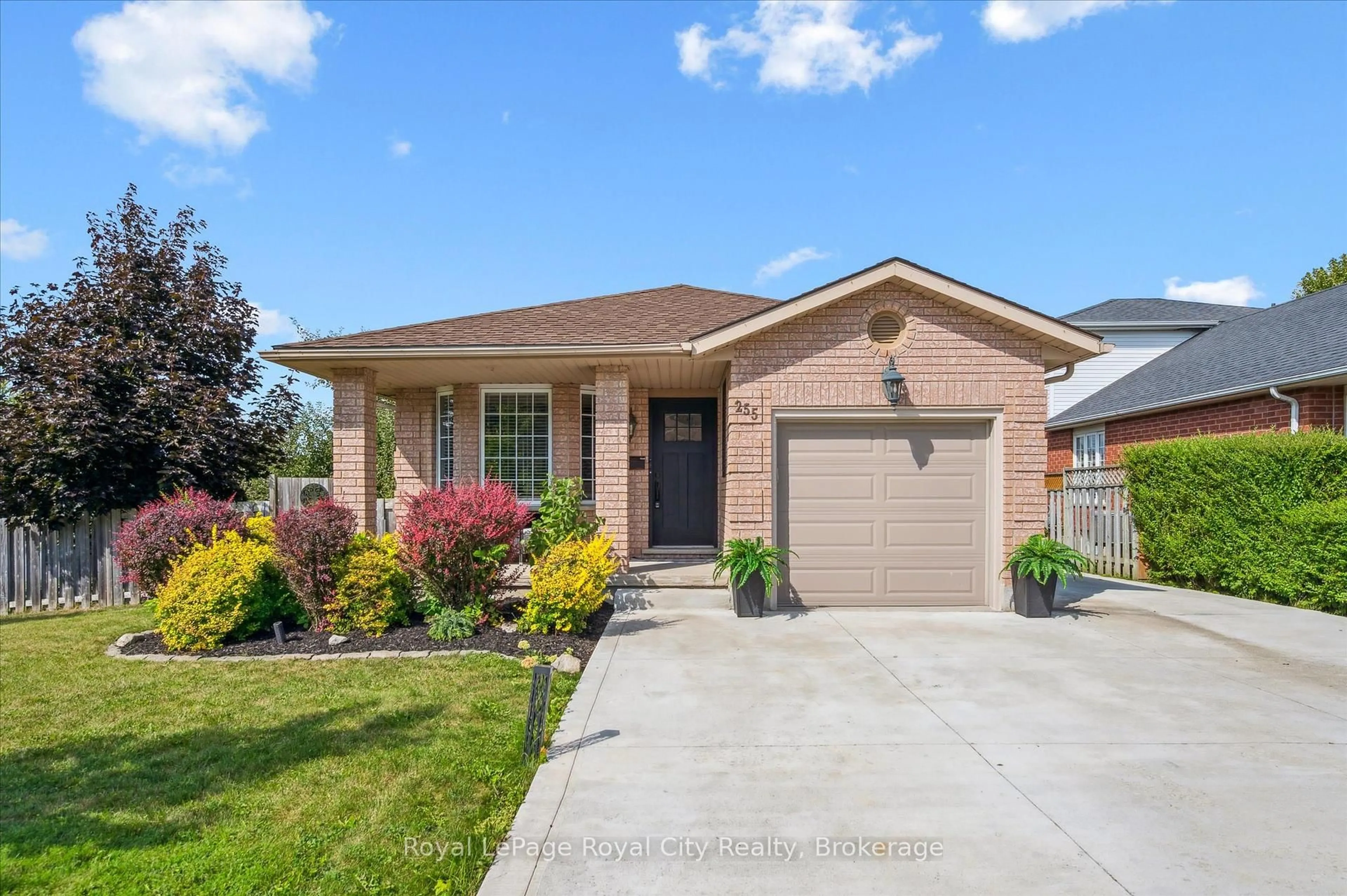 Home with brick exterior material, street for 255 Deerpath Dr, Guelph Ontario N1K 1T8