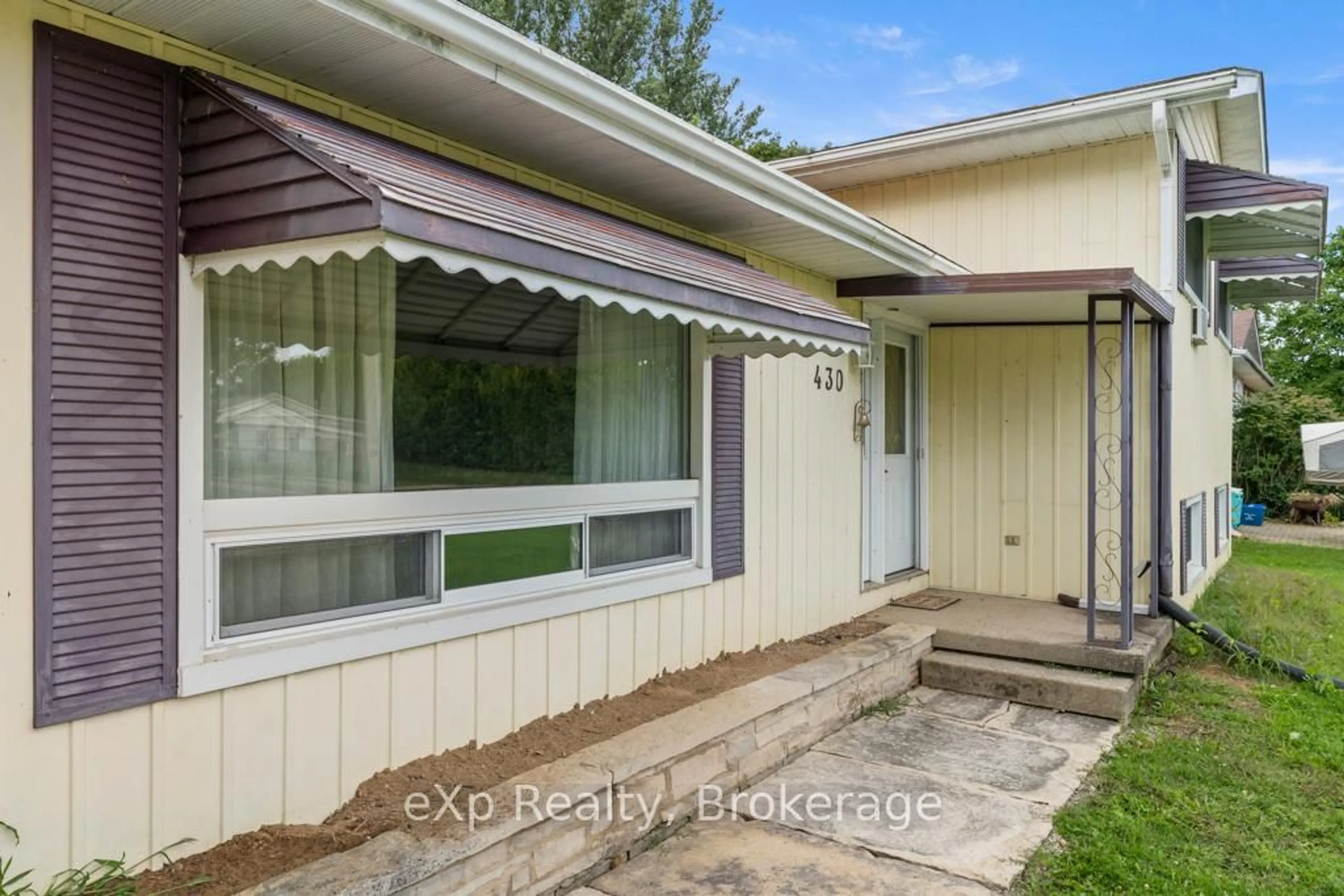 Home with vinyl exterior material, street for 430 Isaac St, South Bruce Peninsula Ontario N0H 2T0
