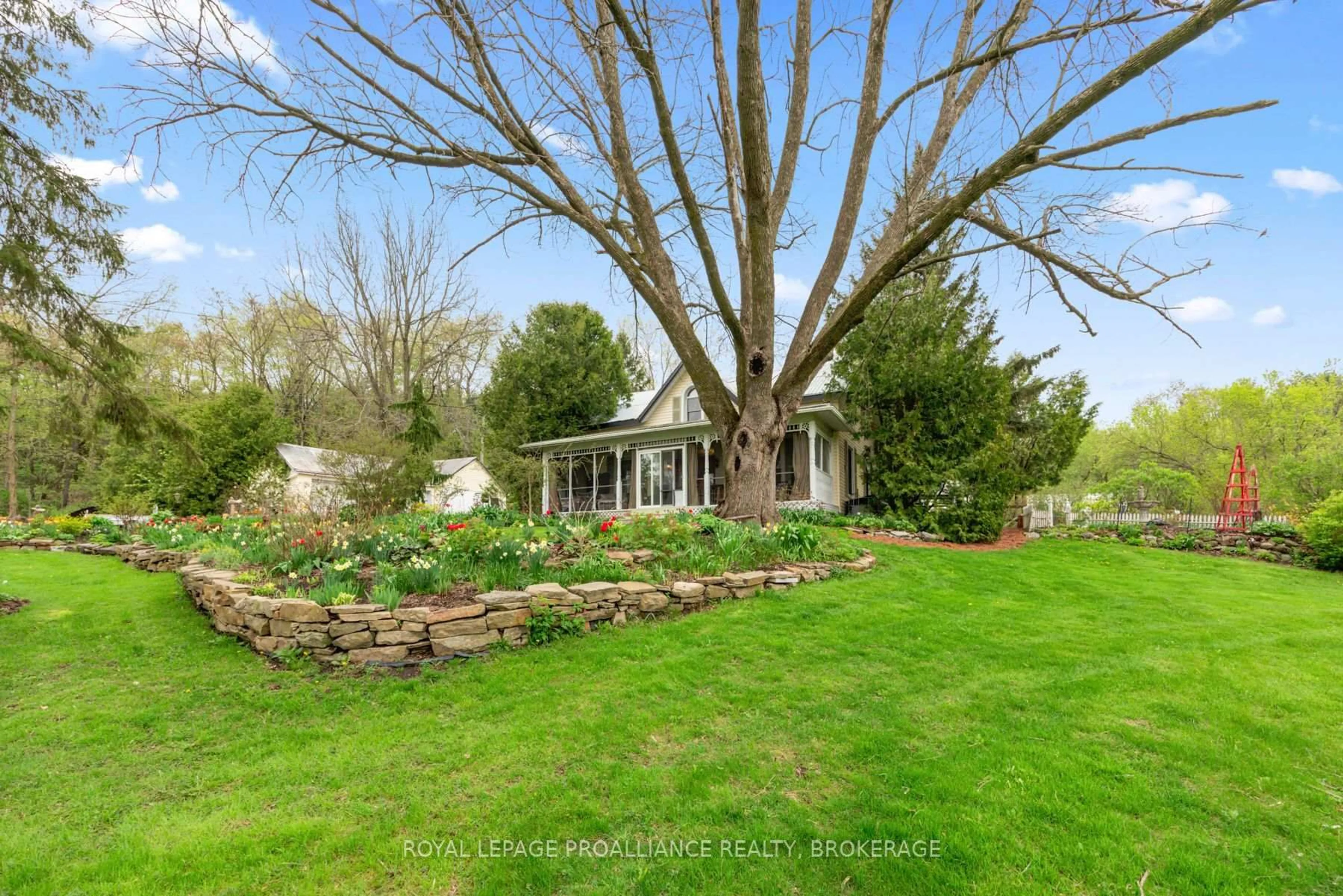 A pic from outside/outdoor area/front of a property/back of a property/a pic from drone, unknown for 2078 Sunbury Rd, Inverary Ontario K0H 1X0