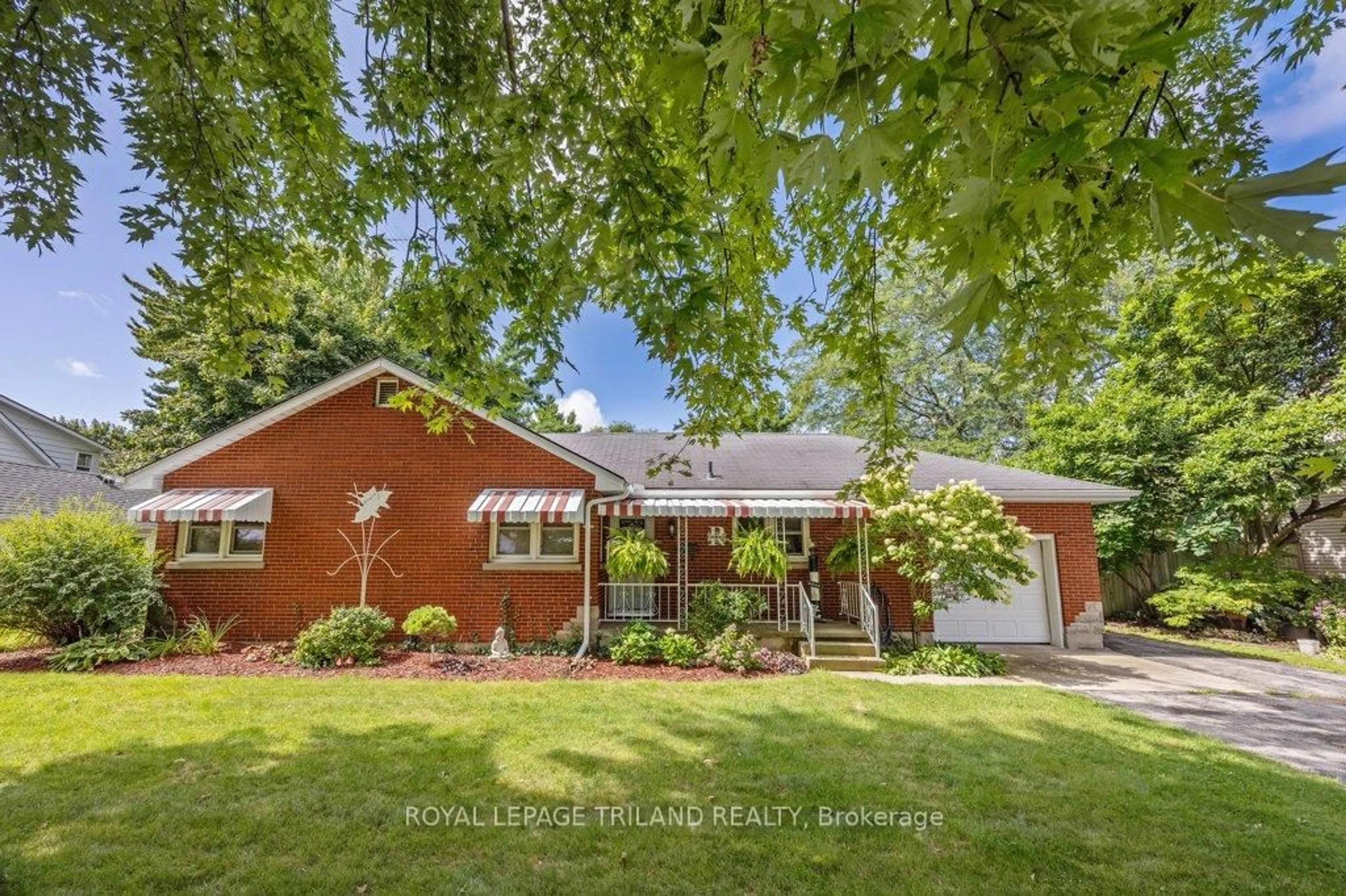 Home with brick exterior material, street for 236 Sunset Dr, St. Thomas Ontario N5R 3C3