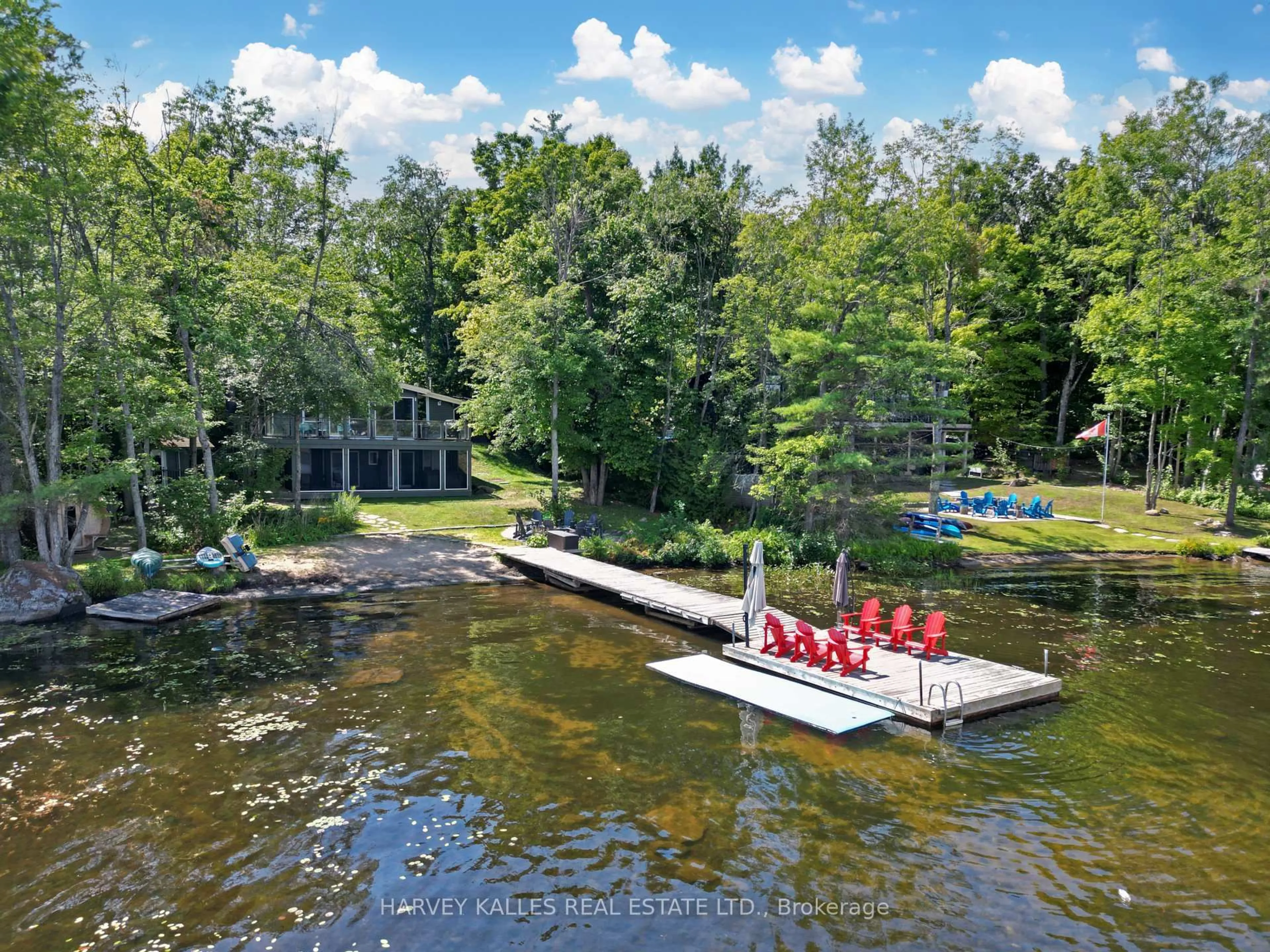 A pic from outside/outdoor area/front of a property/back of a property/a pic from drone, water/lake/river/ocean view for 83 Pinetree Rd, Gravenhurst Ontario P1P 1R2