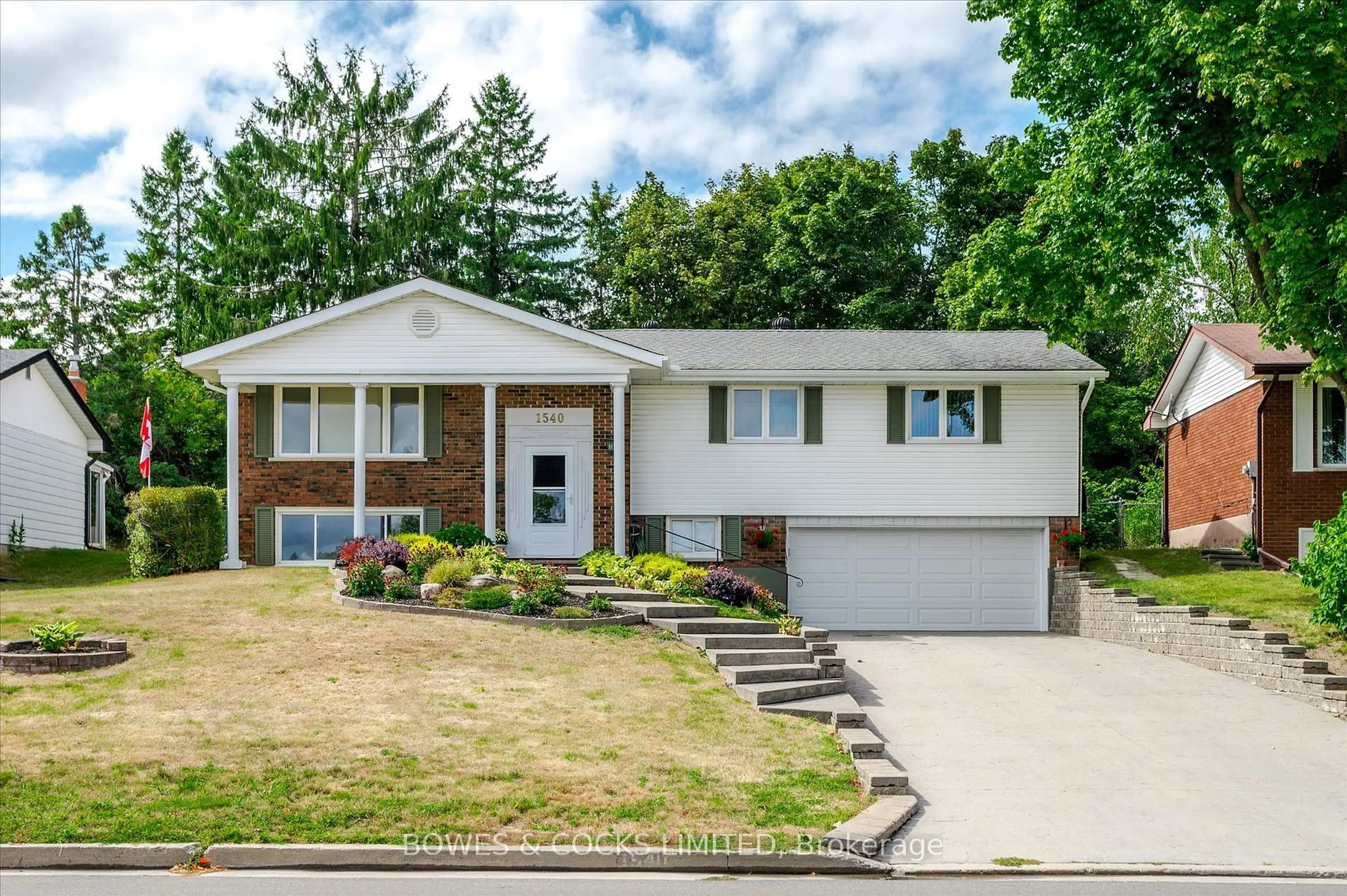 Home with vinyl exterior material, street for 1540 Cherryhill Rd, Peterborough Ontario K9K 1A8