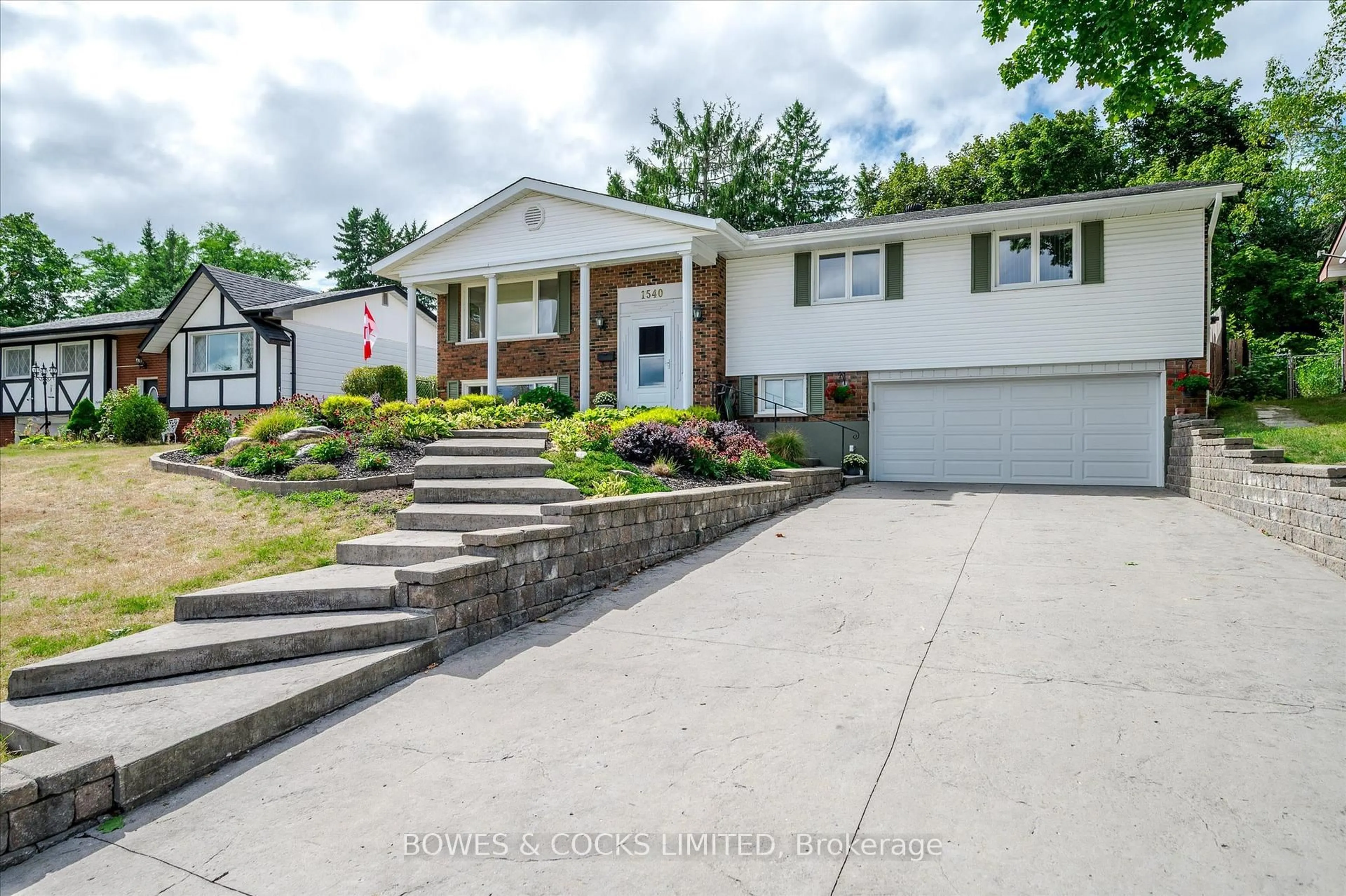 Home with vinyl exterior material, street for 1540 Cherryhill Rd, Peterborough Ontario K9K 1A8