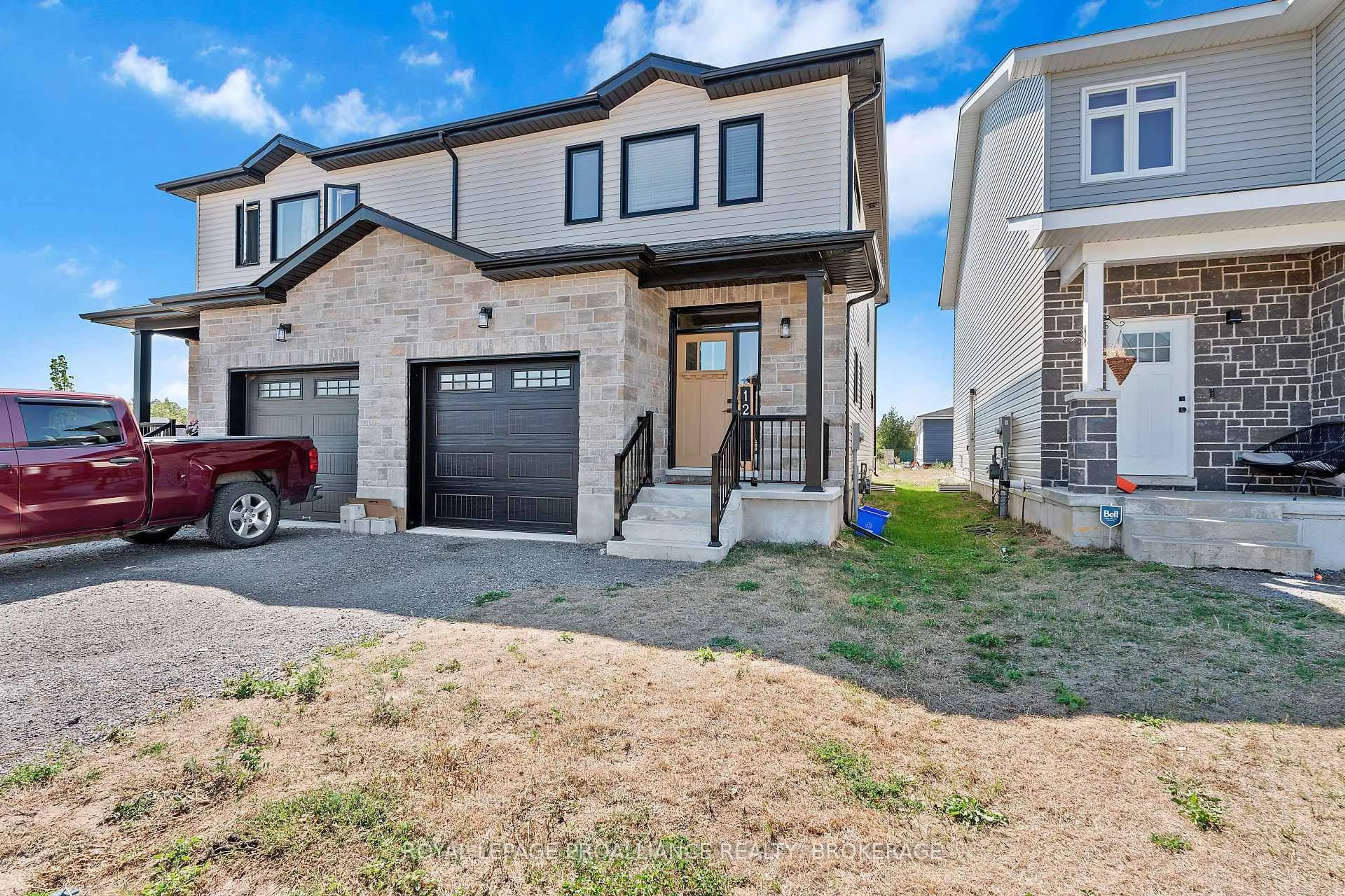 Home with brick exterior material, street for 12 Dusenbury Cres, Bissett Creek Ontario K0H 2H0