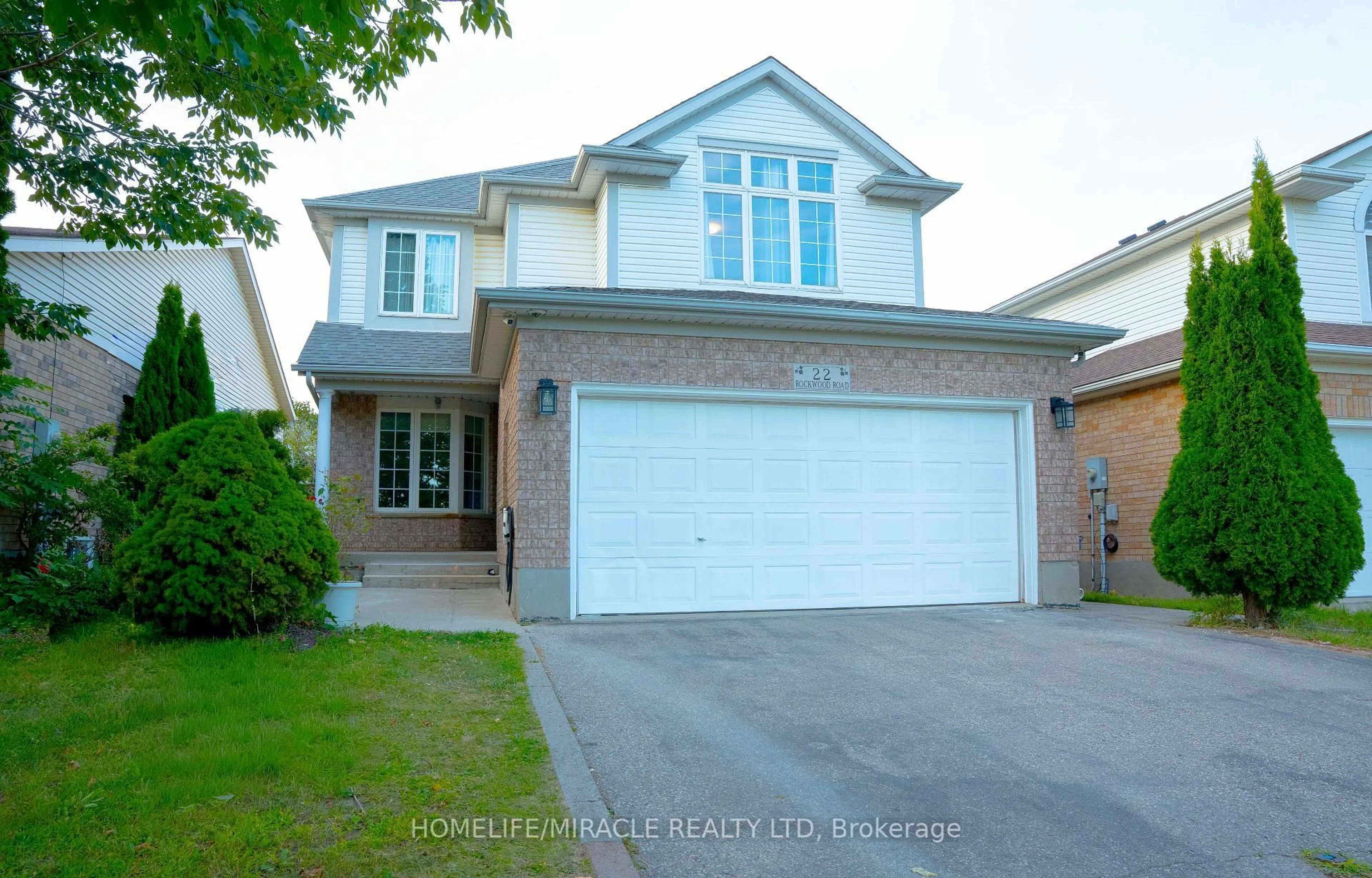 Home with vinyl exterior material, street for 22 Rockwood Rd, Kitchener Ontario N2E 3S5