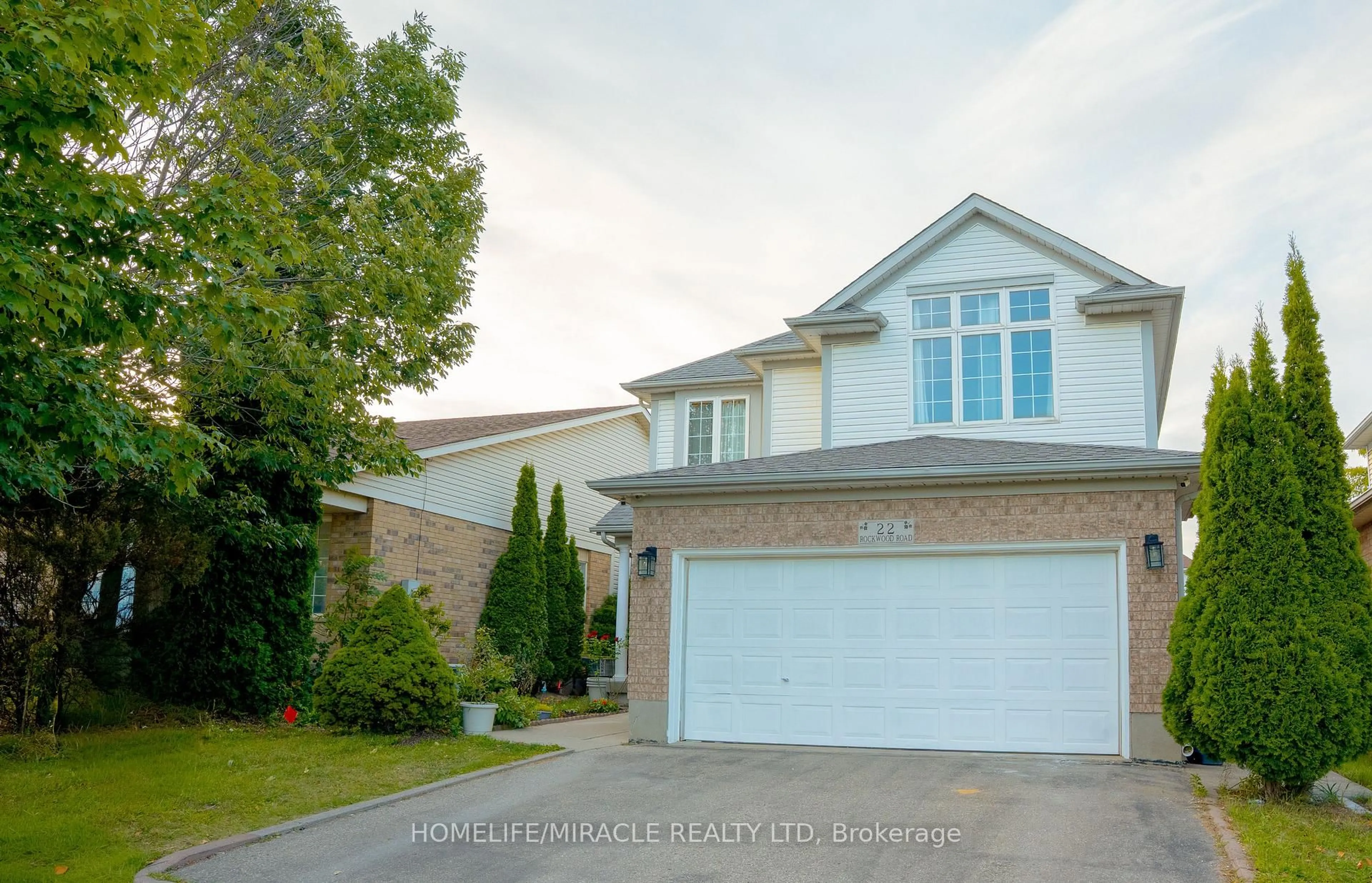 Home with vinyl exterior material, street for 22 Rockwood Rd, Kitchener Ontario N2E 3S5