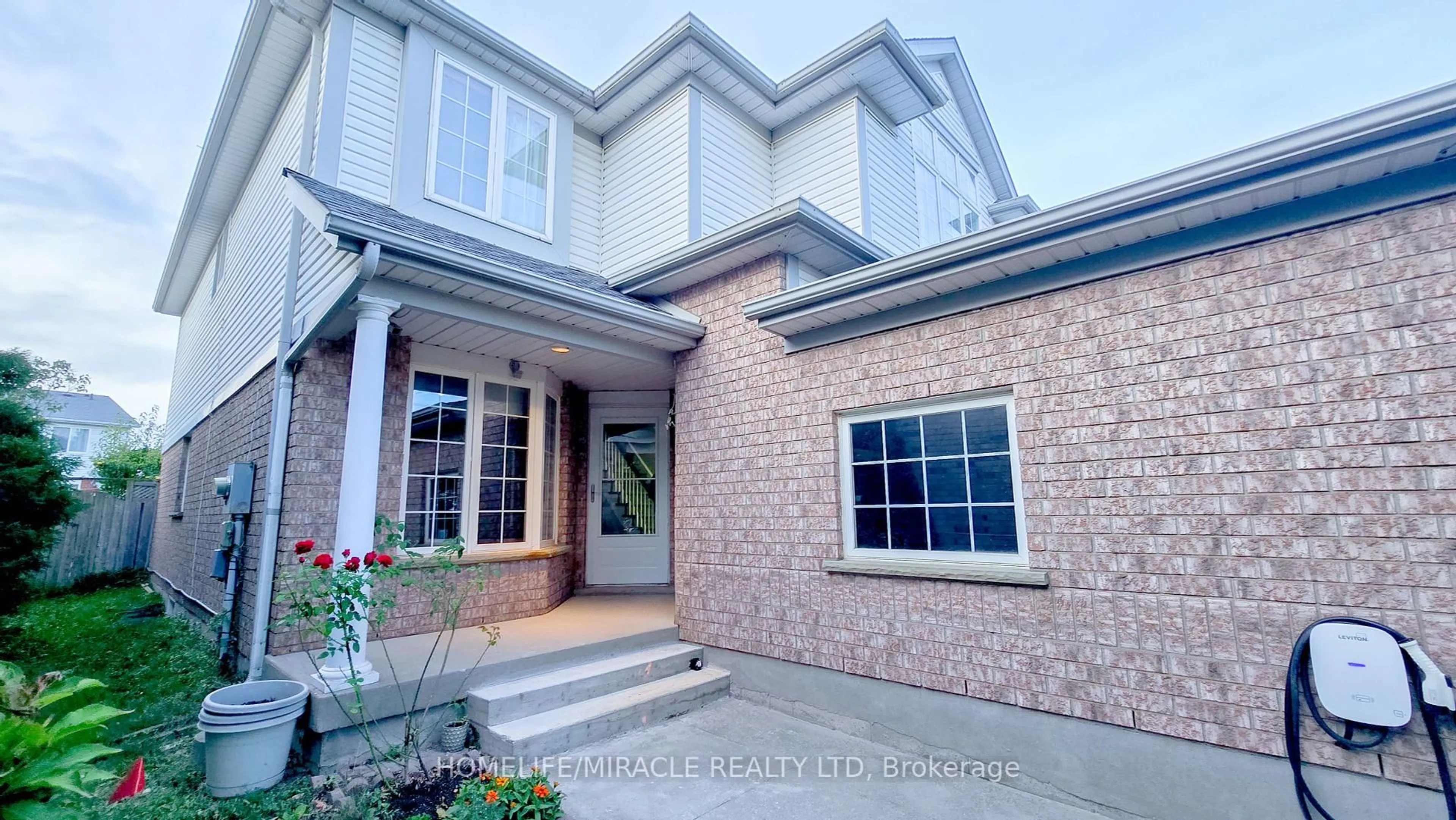 Home with brick exterior material, street for 22 Rockwood Rd, Kitchener Ontario N2E 3S5