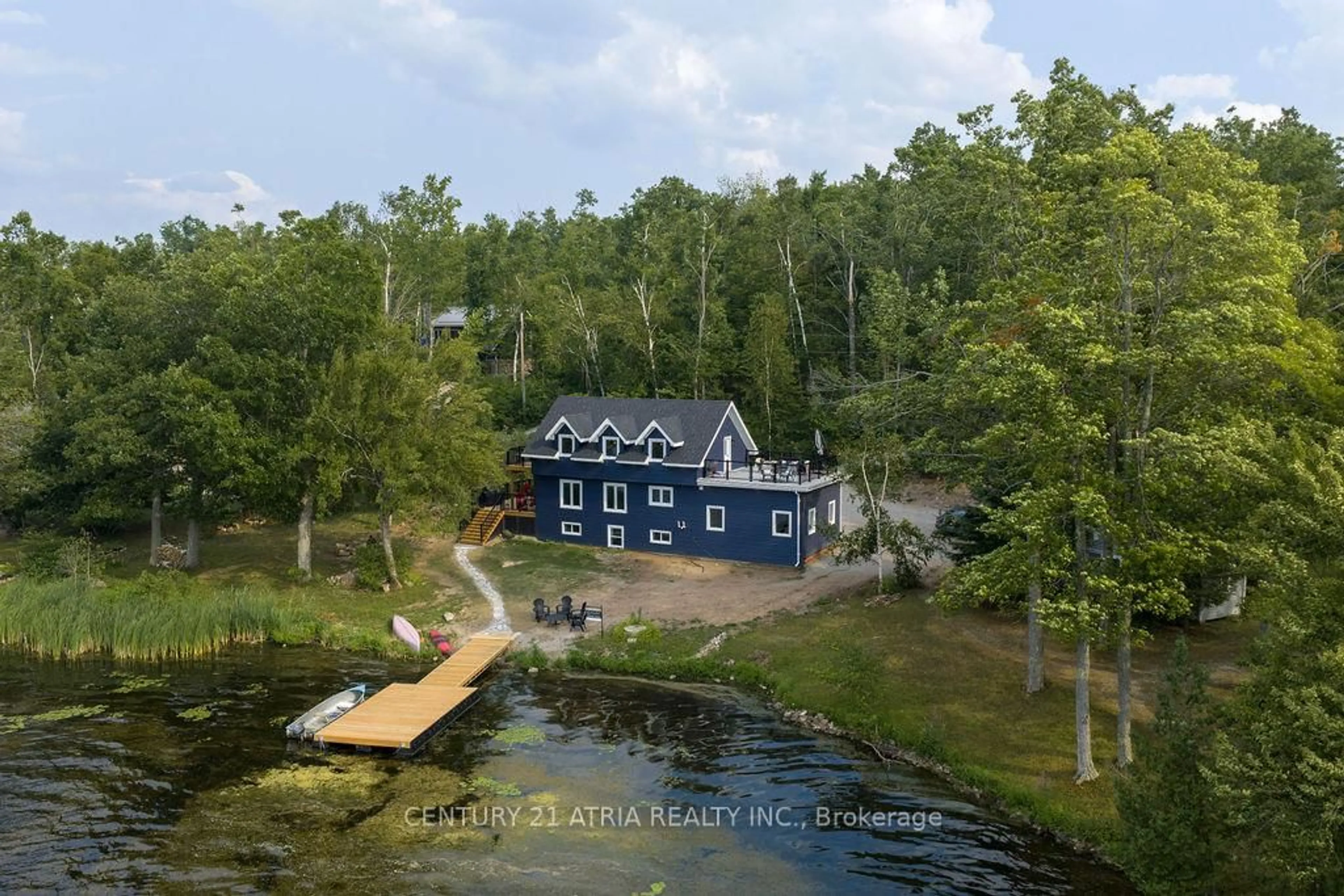 A pic from outside/outdoor area/front of a property/back of a property/a pic from drone, water/lake/river/ocean view for 2314 Armstrong Lane, Selwyn Ontario K0L 2H0
