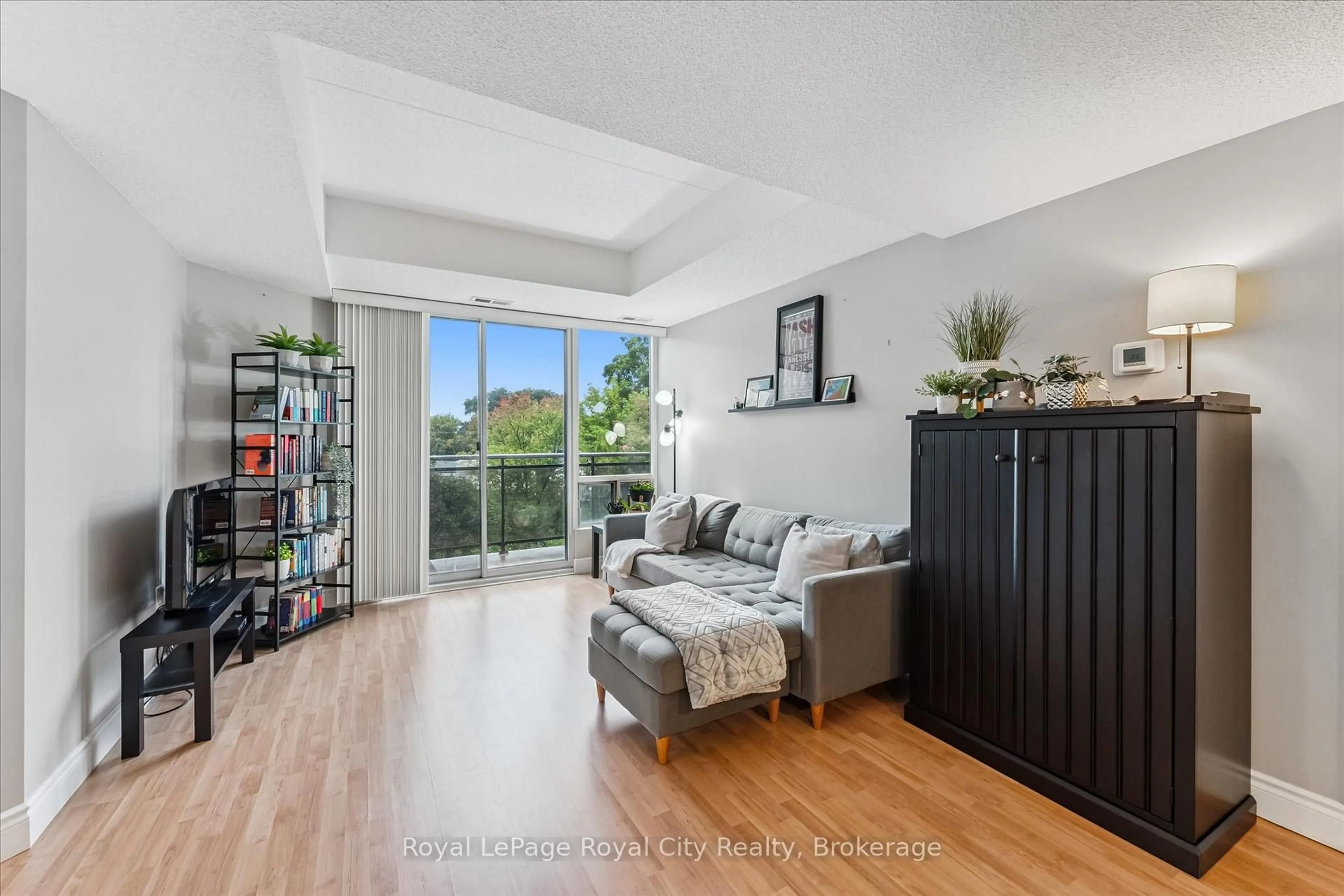 Living room with furniture, unknown for 105 Bagot St #403, Guelph Ontario N1H 8H4