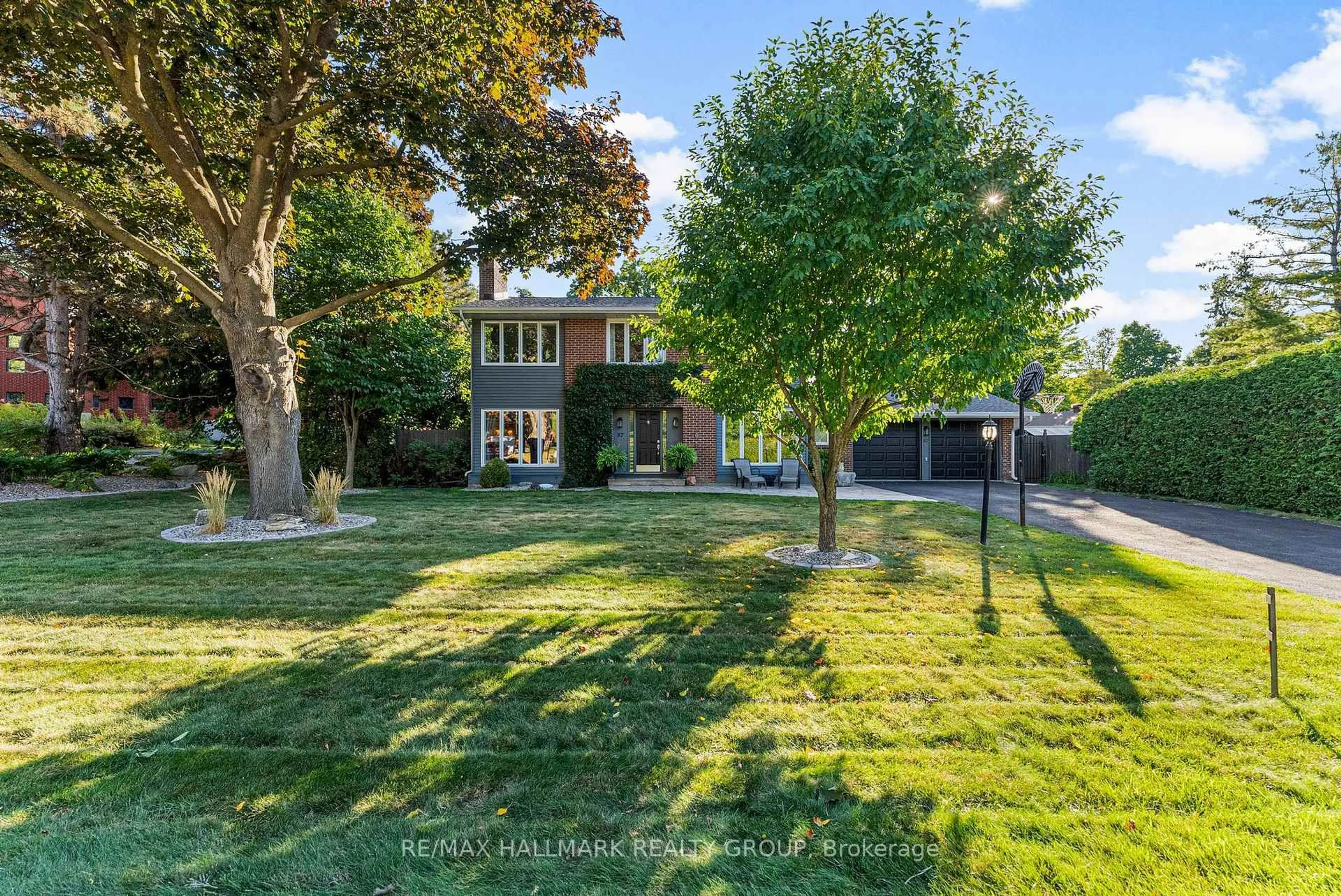 A pic from outside/outdoor area/front of a property/back of a property/a pic from drone, street for 87 Leacock Dr, Kanata Ontario K2K 1S5