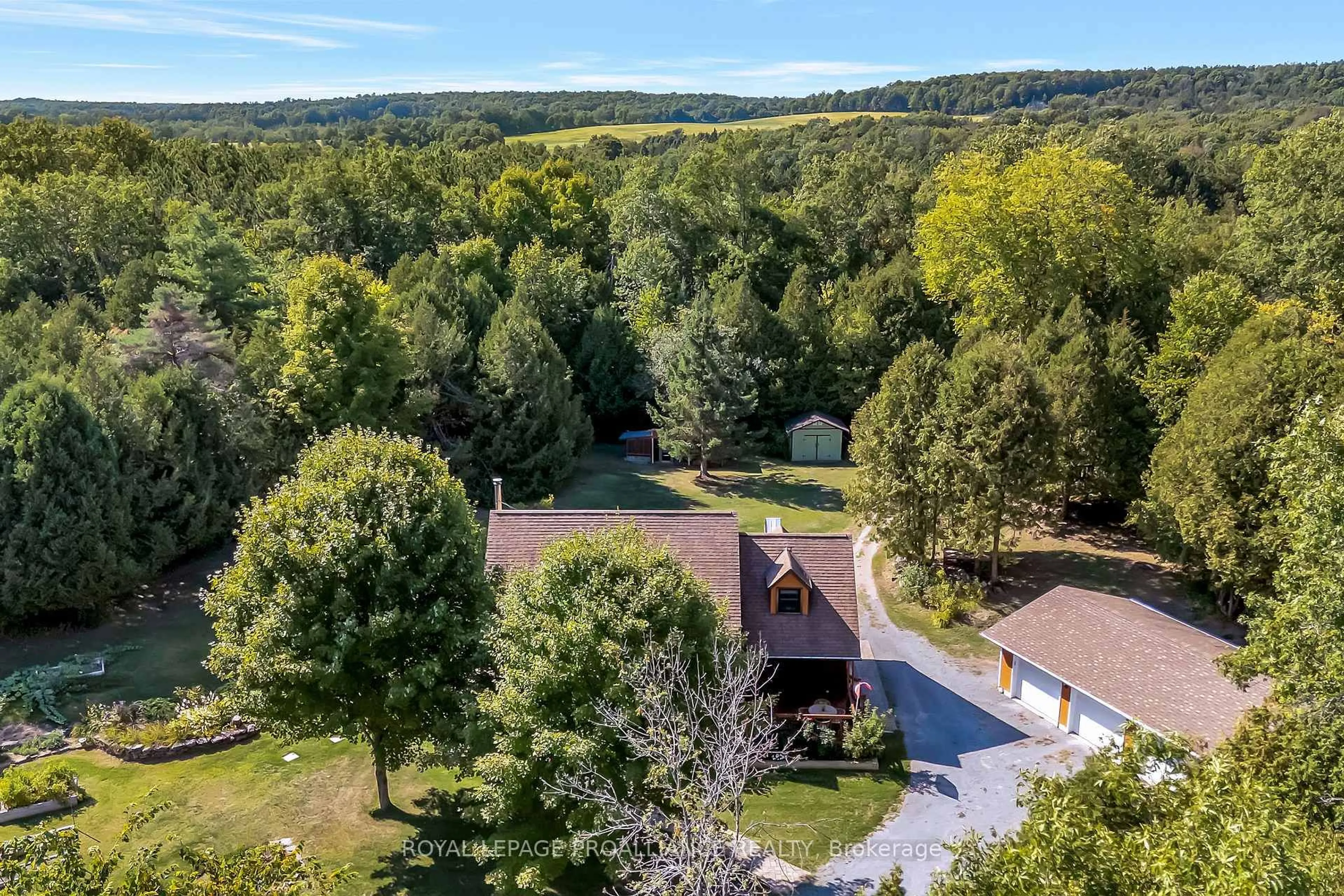 A pic from outside/outdoor area/front of a property/back of a property/a pic from drone, forest/trees view for 1779 Moira Rd, Belleville Ontario K0K 2Y0