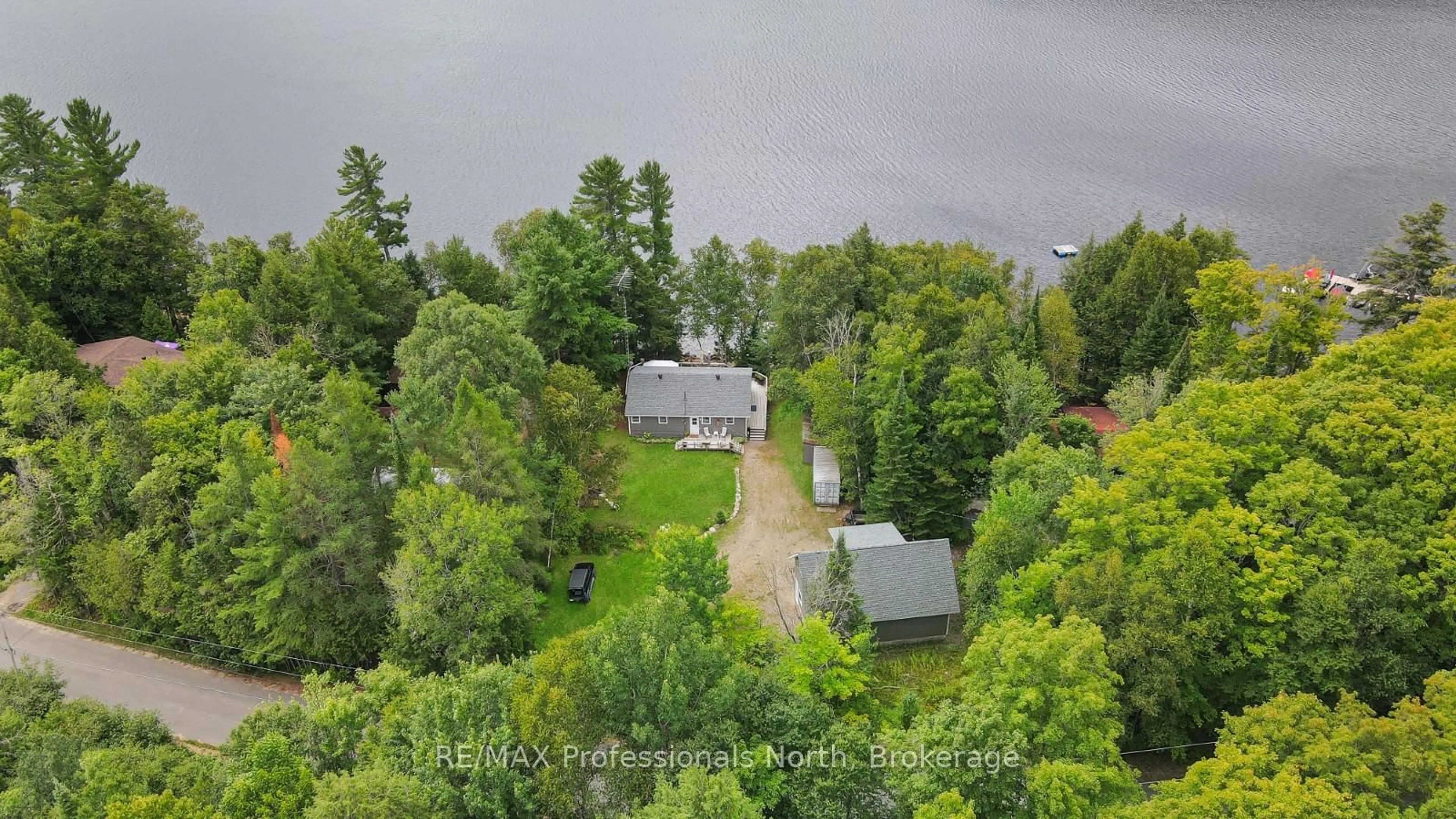 A pic from outside/outdoor area/front of a property/back of a property/a pic from drone, forest/trees view for 2375 Watts Rd, Dysart et al Ontario K0M 1S0
