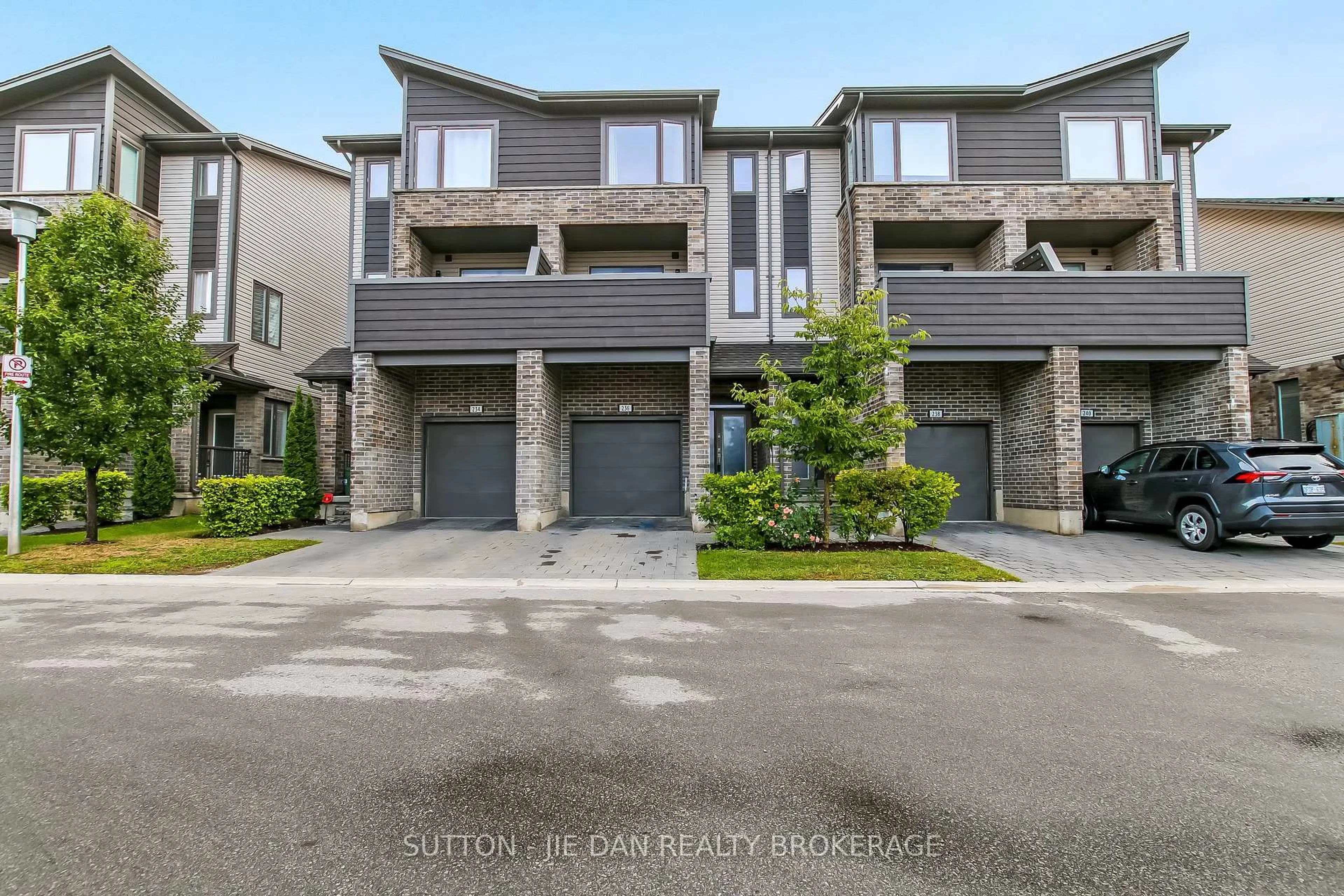 A pic from outside/outdoor area/front of a property/back of a property/a pic from drone, street for 1960 Dalmagarry Rd #236, London North Ontario N6G 0T8