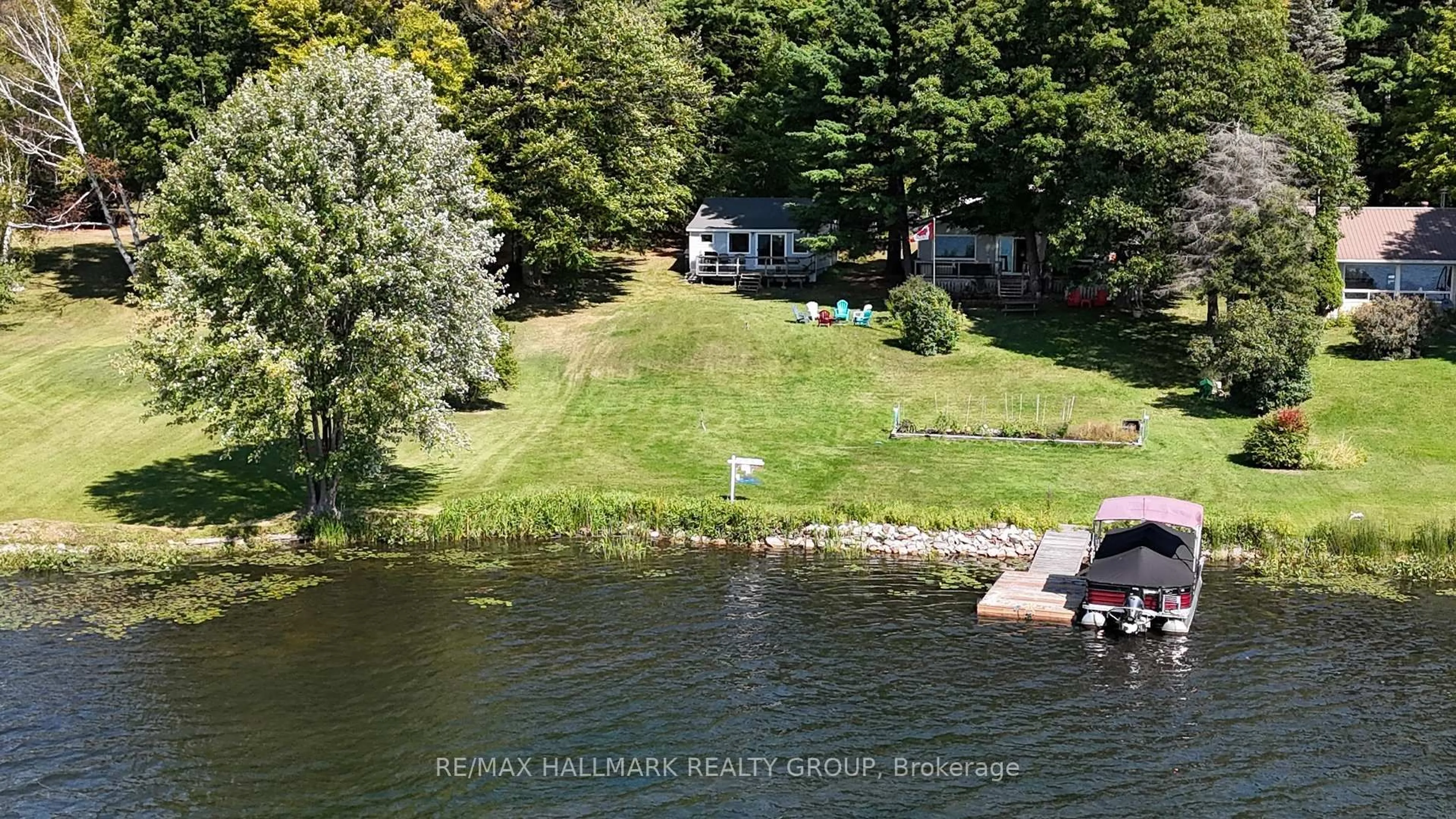 A pic from outside/outdoor area/front of a property/back of a property/a pic from drone, water/lake/river/ocean view for 8A Barron Lane, White Lake Ontario K0A 3L0