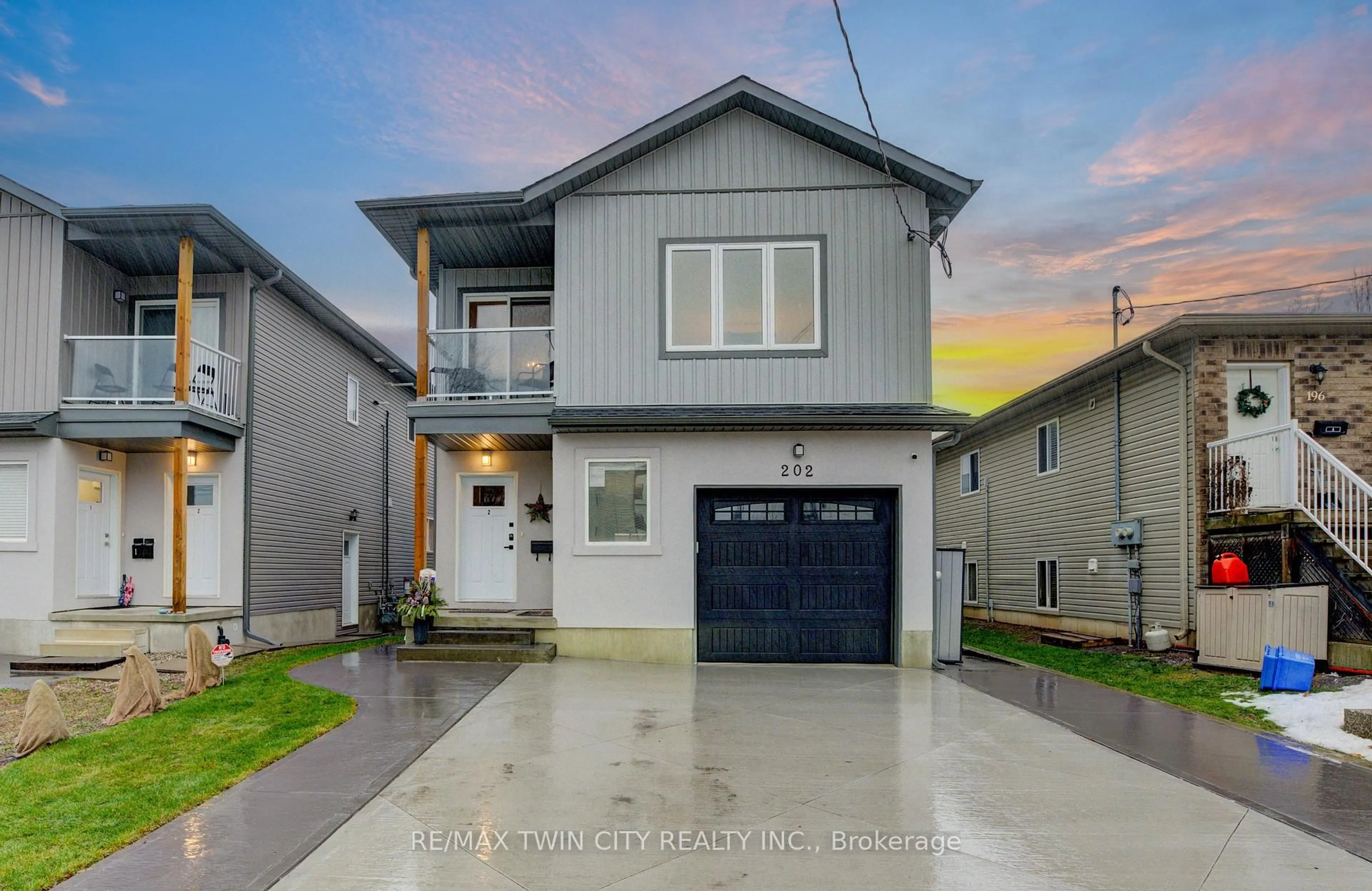 Home with vinyl exterior material, street for 202 Fifth Ave, Kitchener Ontario N2C 1P7