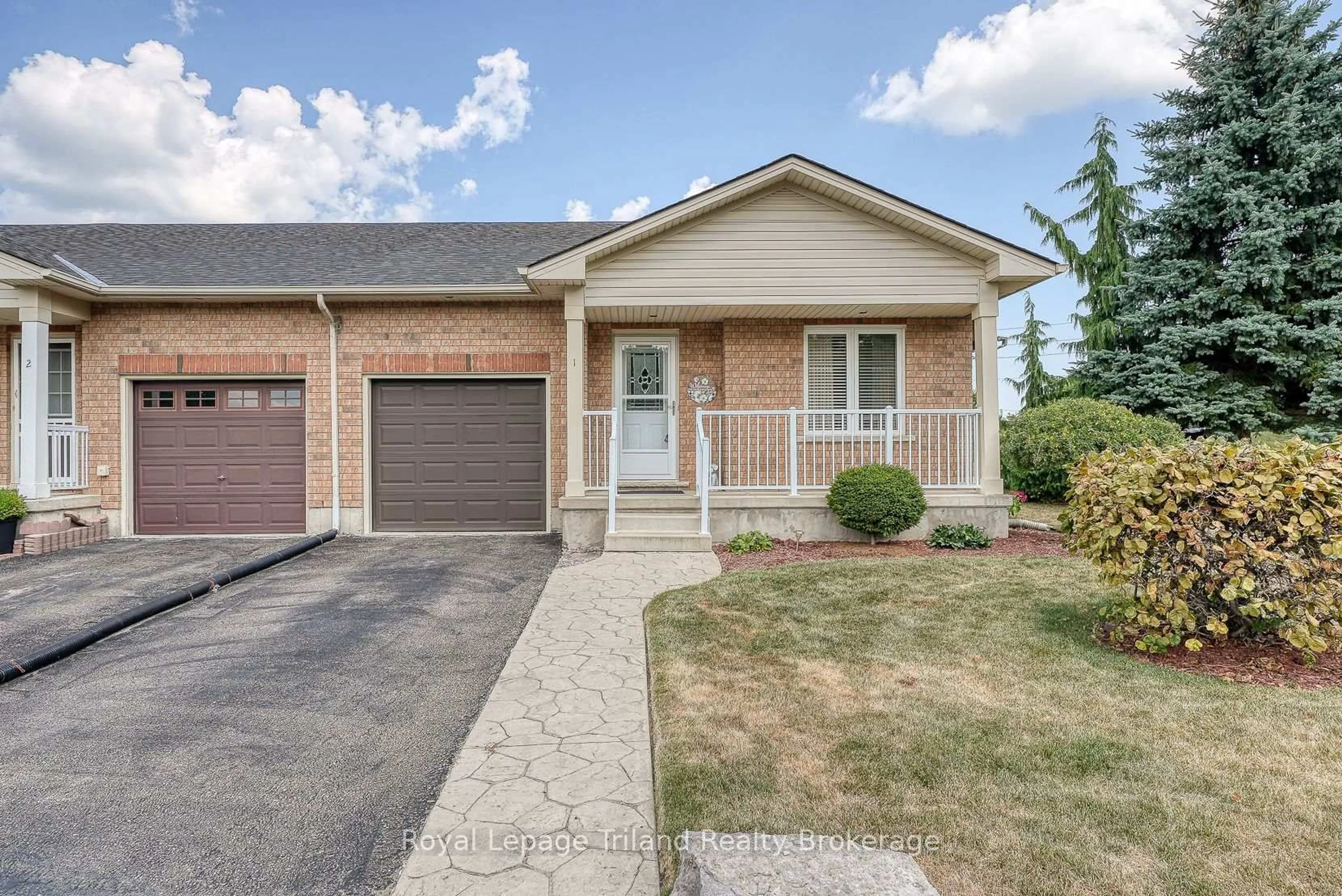 Home with brick exterior material, street for 54 Garden Ave #1, Brantford Ontario N3S 0A1