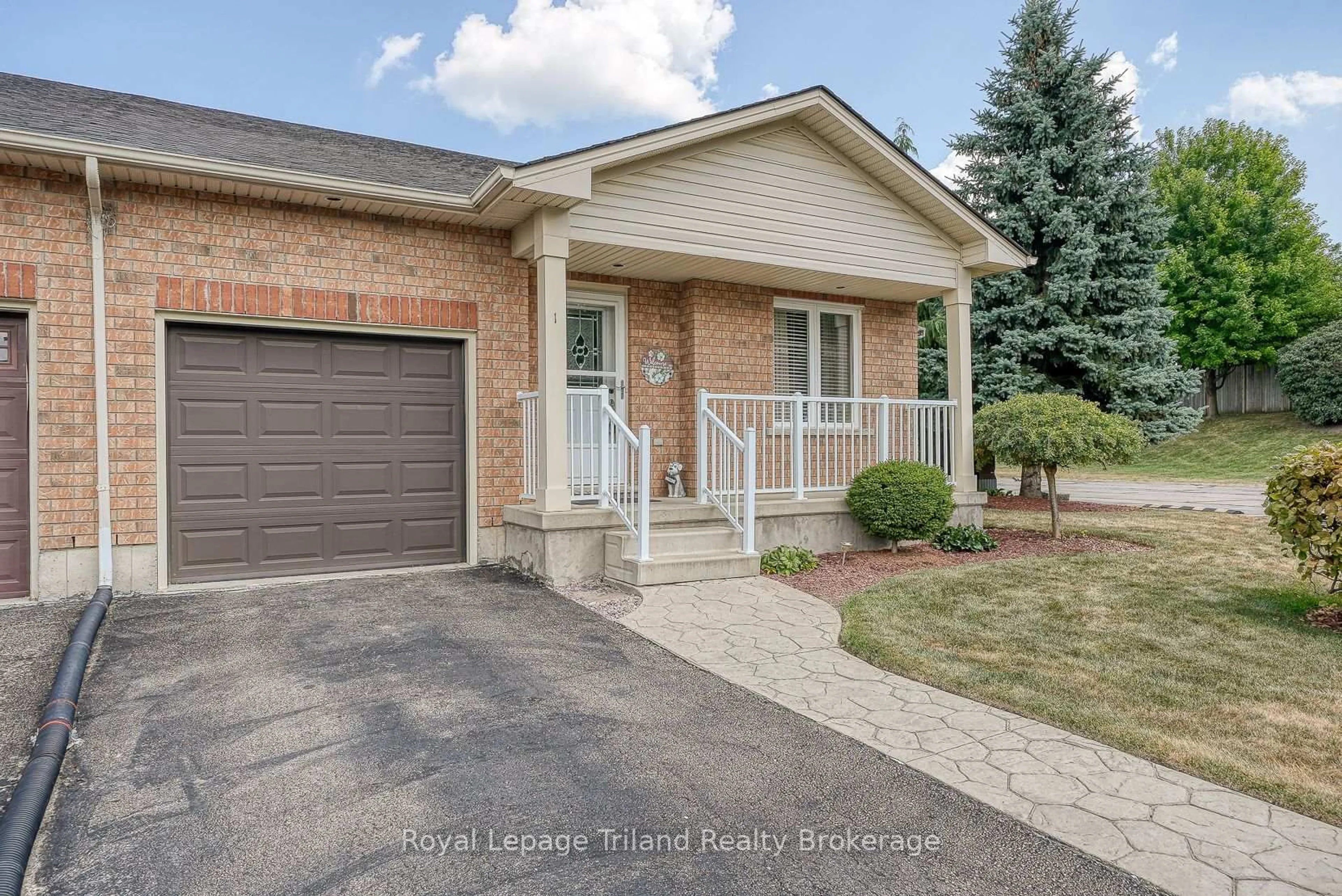Home with brick exterior material, street for 54 Garden Ave #1, Brantford Ontario N3S 0A1